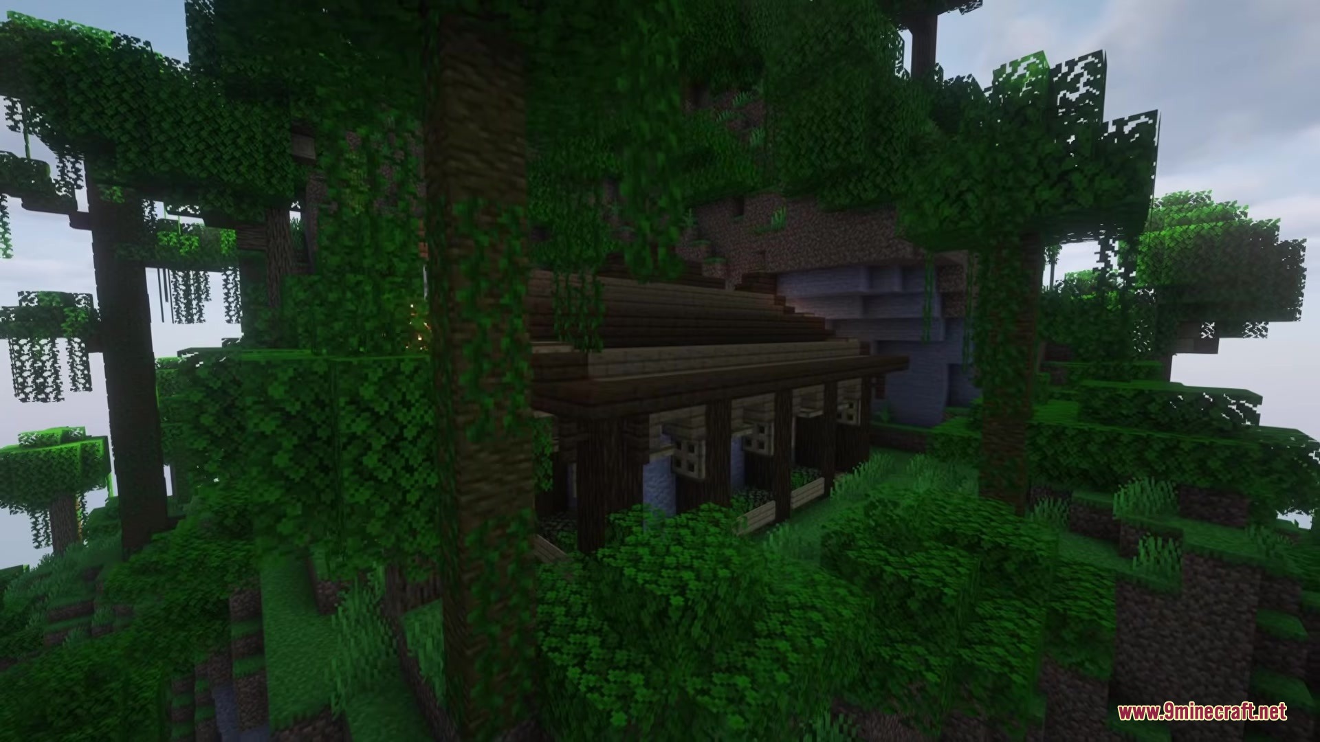A wooden dungeon from Much More Dungeons Mod hidden in a dense jungle