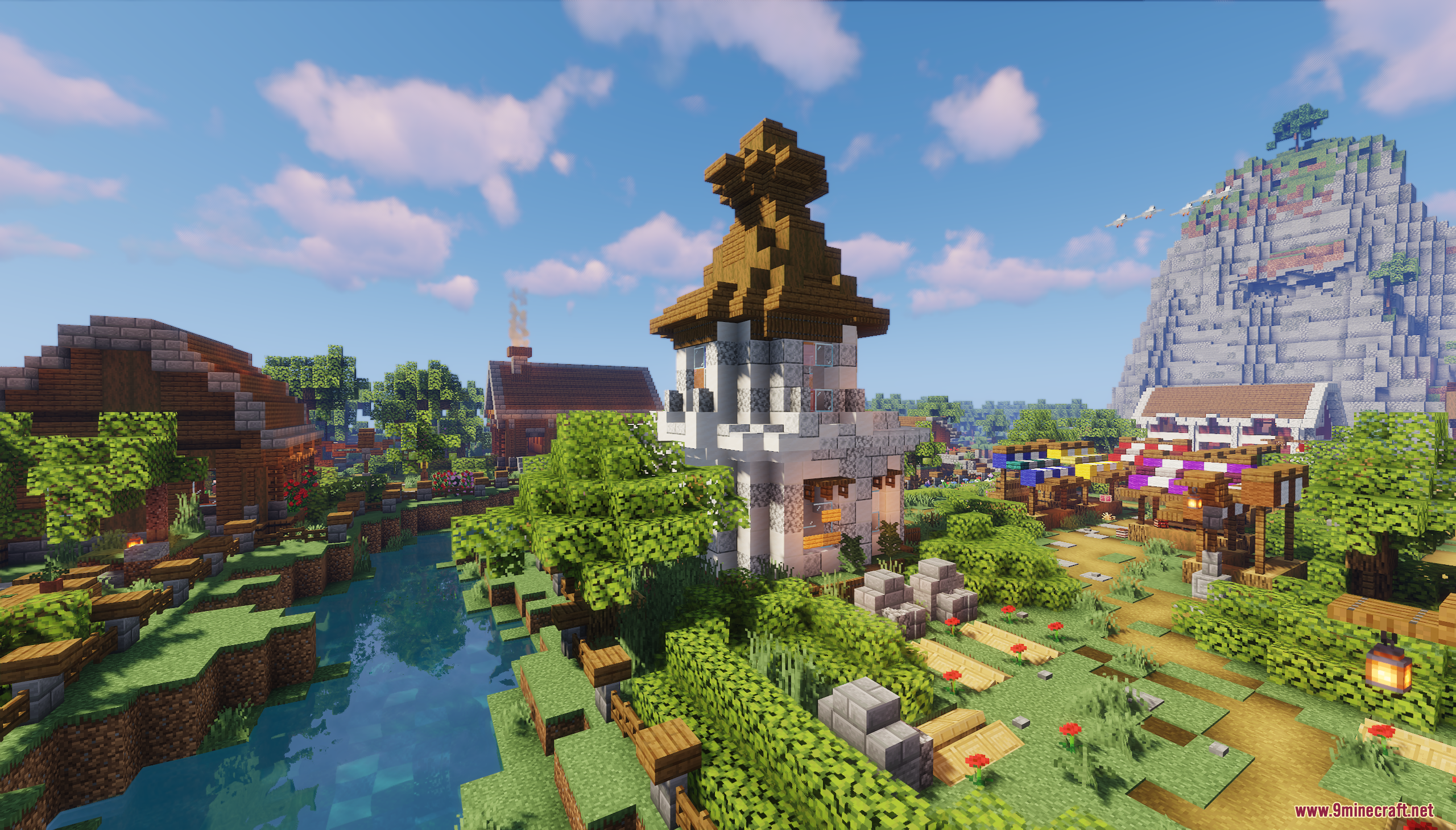 Murder Mystery Just Village Map Screenshot 5 A tall white tower overlooks a river in a cozy Minecraft village