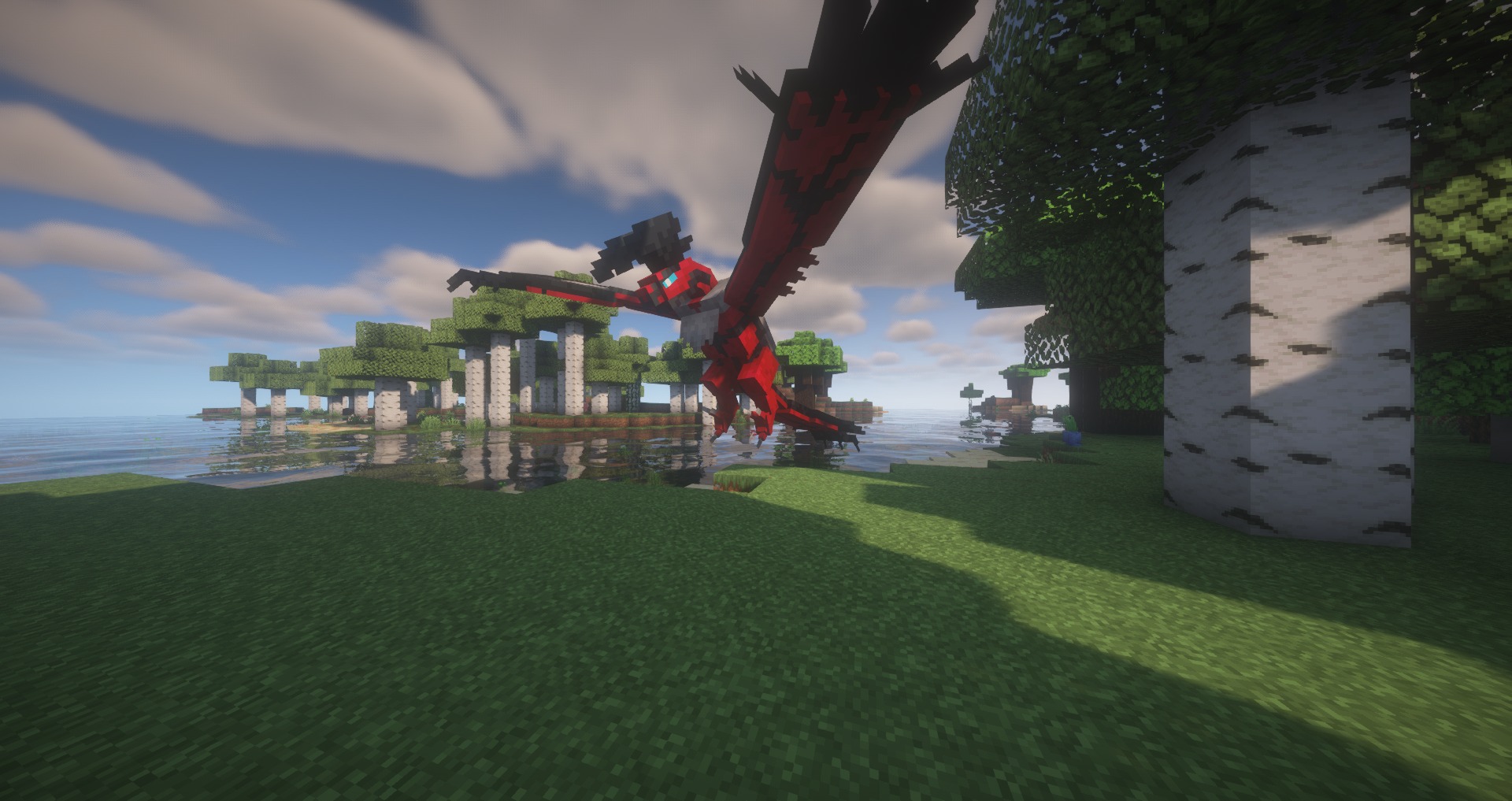 Mystic Mons Data Pack Screenshot 6 Large red legendary creature flying over a birch forest near the water