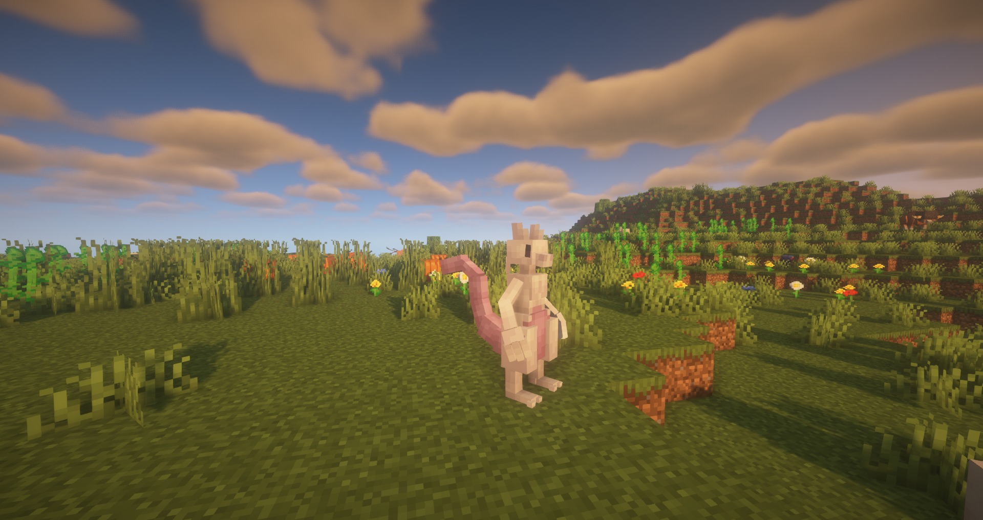 Mystic Mons Data Pack Screenshot 9 Mewtwo stands in a grassy field under a bright blue sky