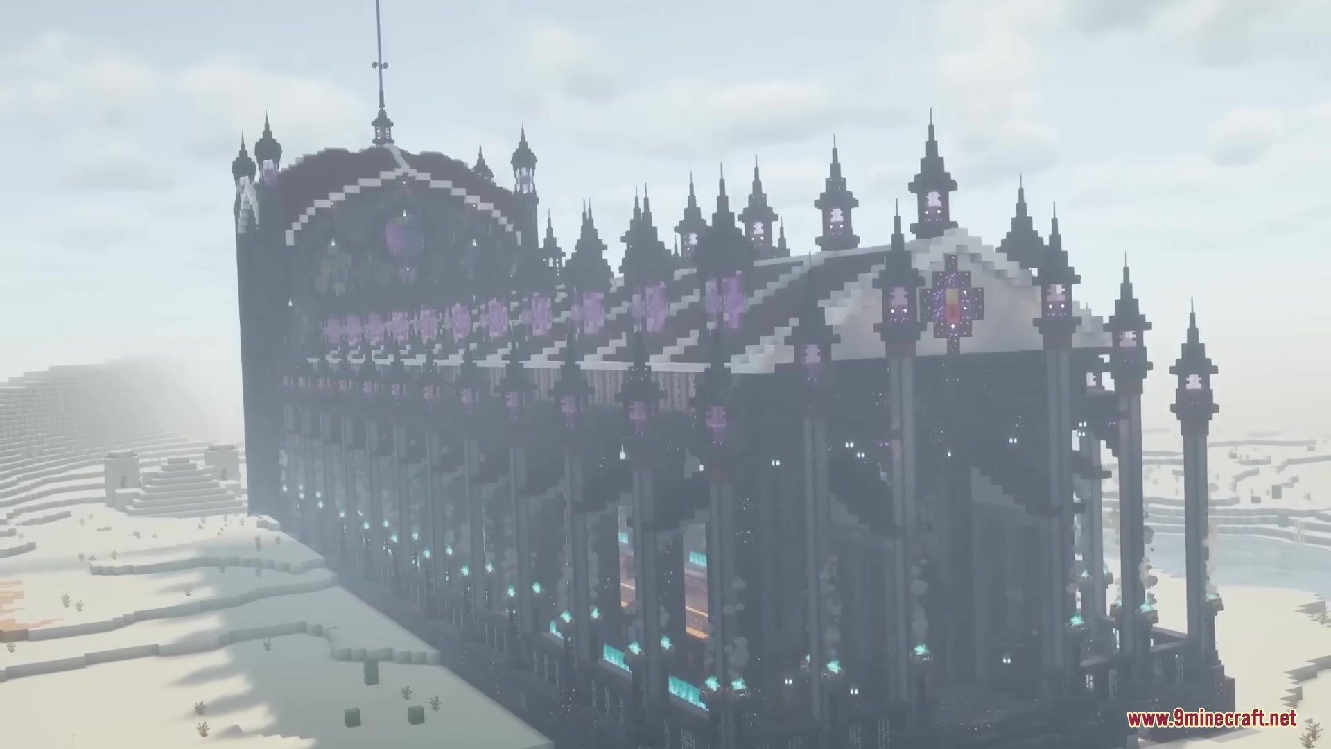A massive dark gothic cathedral structure built in a snowy Minecraft landscape
