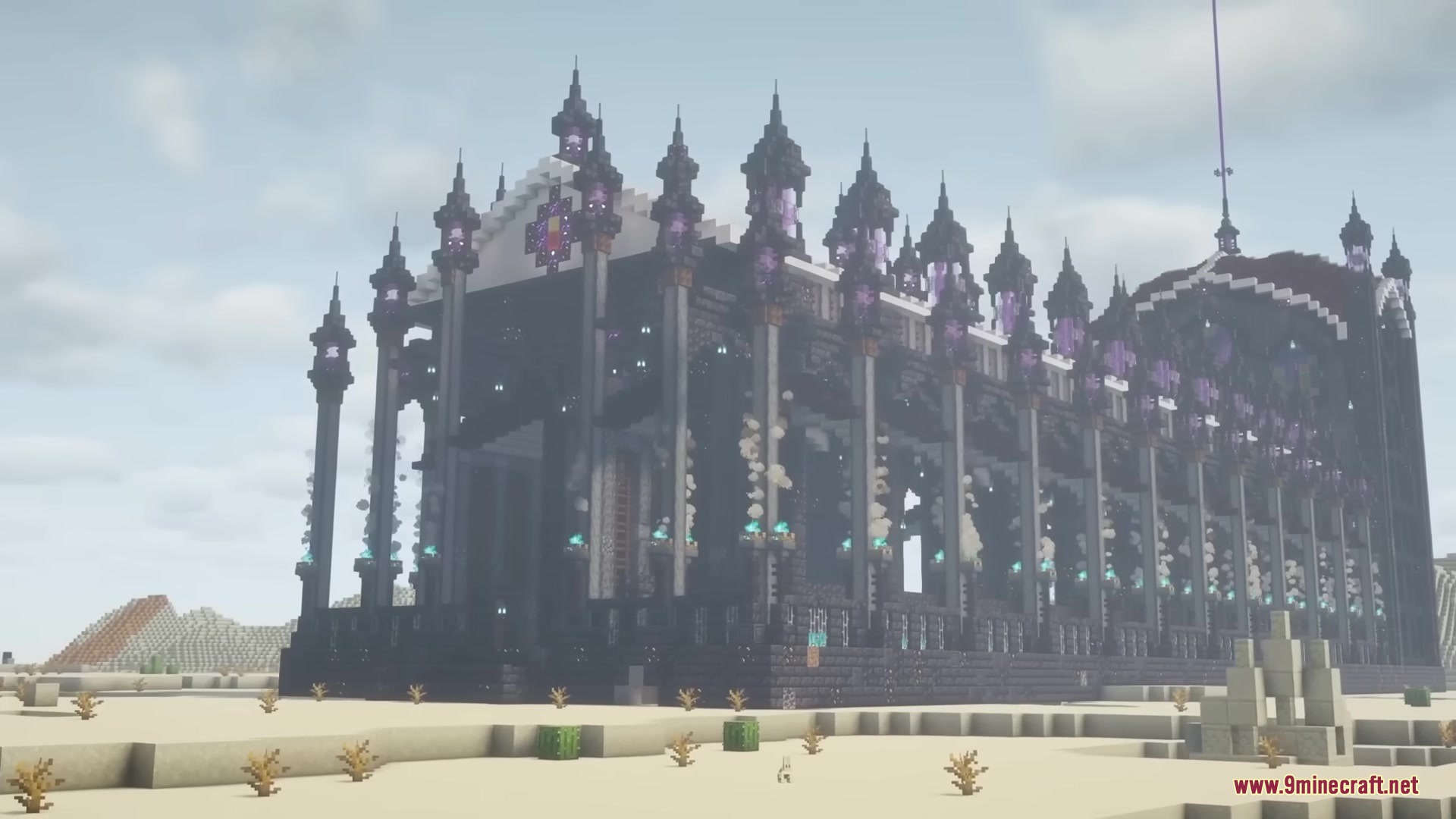 The gate of disaster structure stands as a massive dark cathedral in the desert