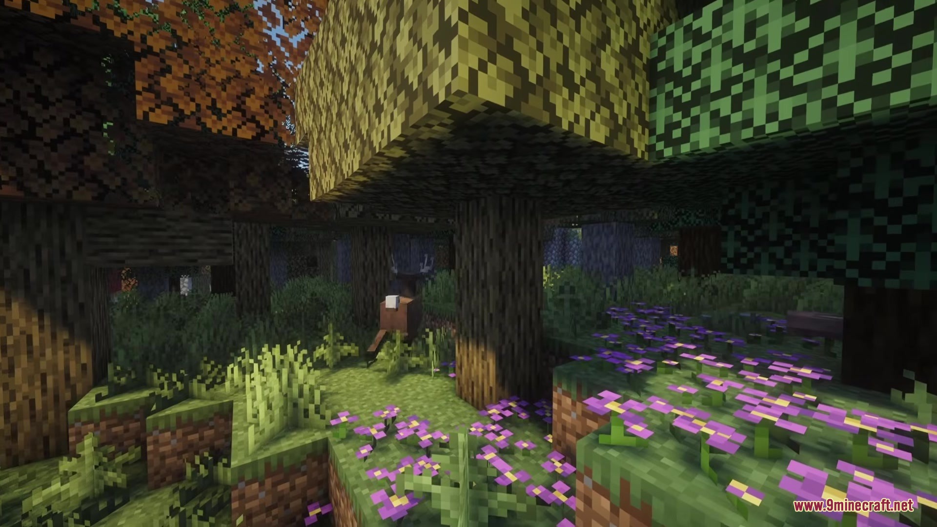 No Mans Land Mod Screenshot 2 A deer wanders through a dense forest with purple flowers and maple trees