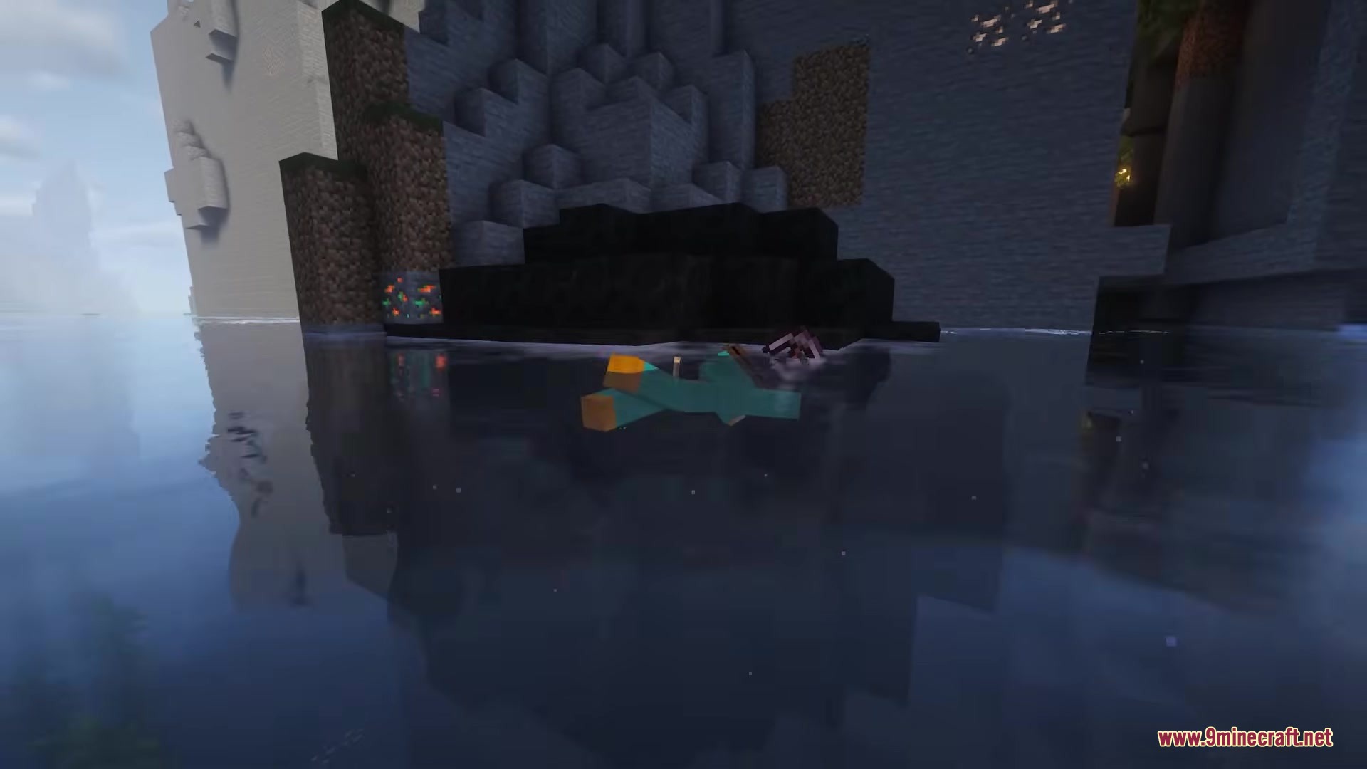 A player wearing a platypus skin swimming in a lake near some cliffs