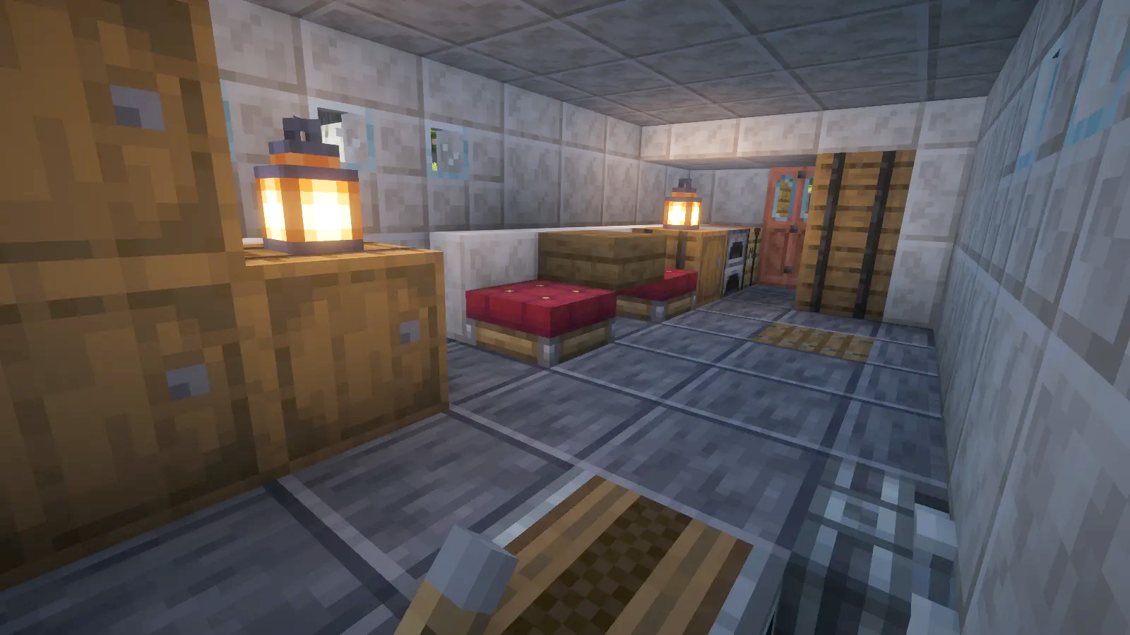 Ocean Hammer Schematic Screenshots 1 Interior of a ship cabin with wooden storage barrels and warm glowing lanterns