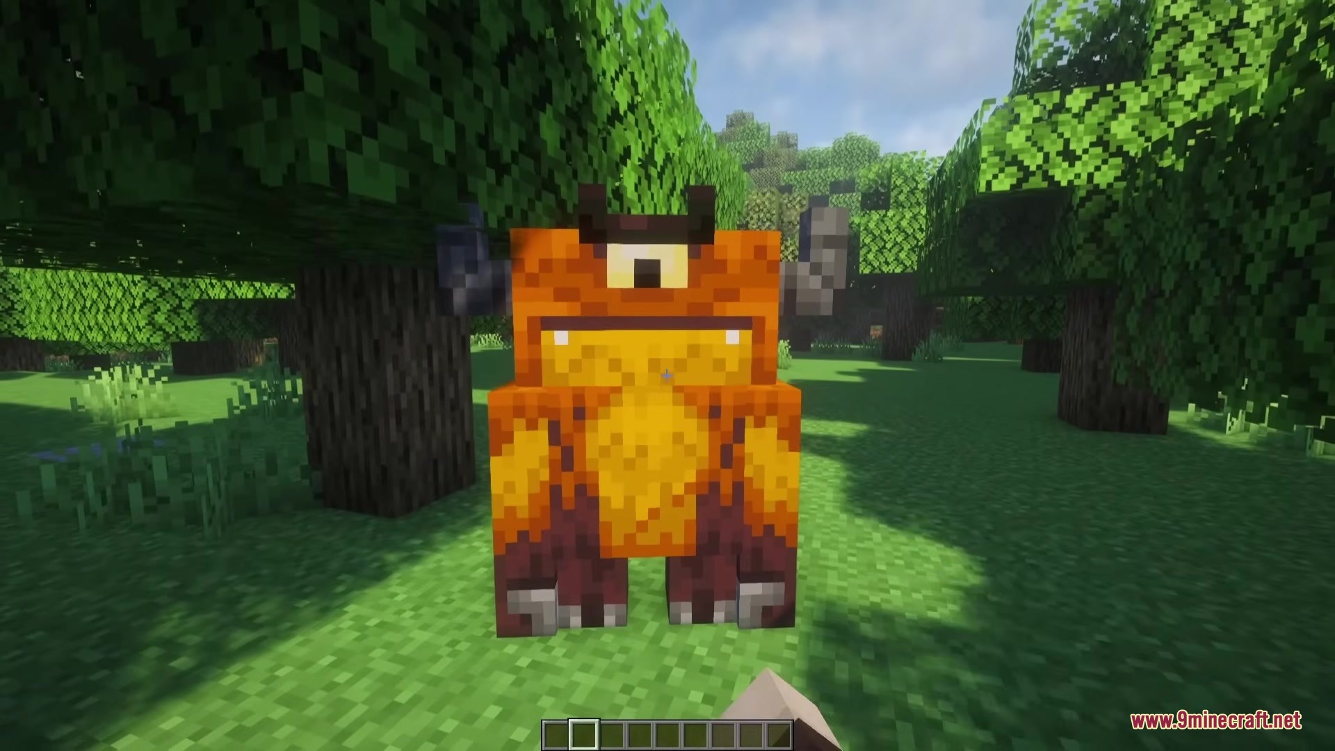 One Big Eye Mod Screenshot 3 A large orange Mylops creature stands in the middle of a forest