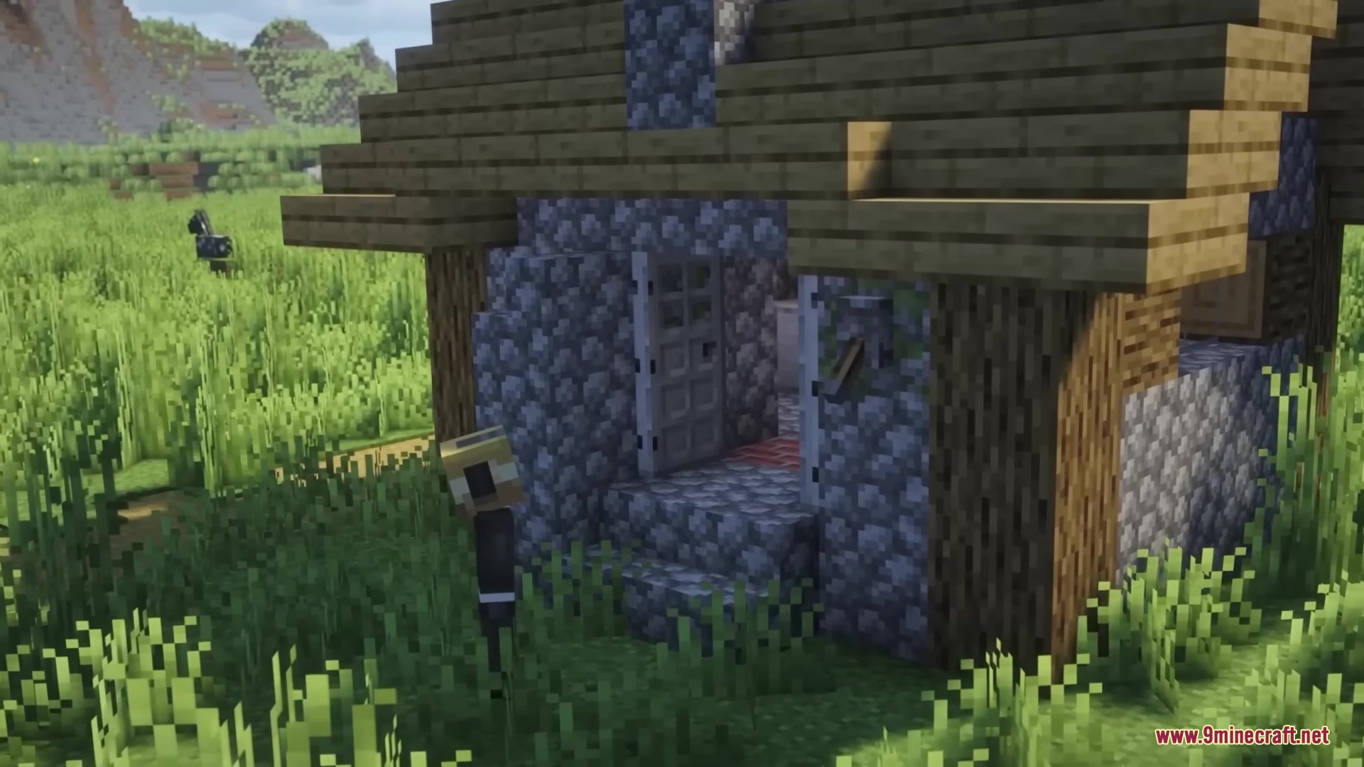 Open Together Mod Screenshot 7 A player character standing in front of a cobblestone house with open double doors