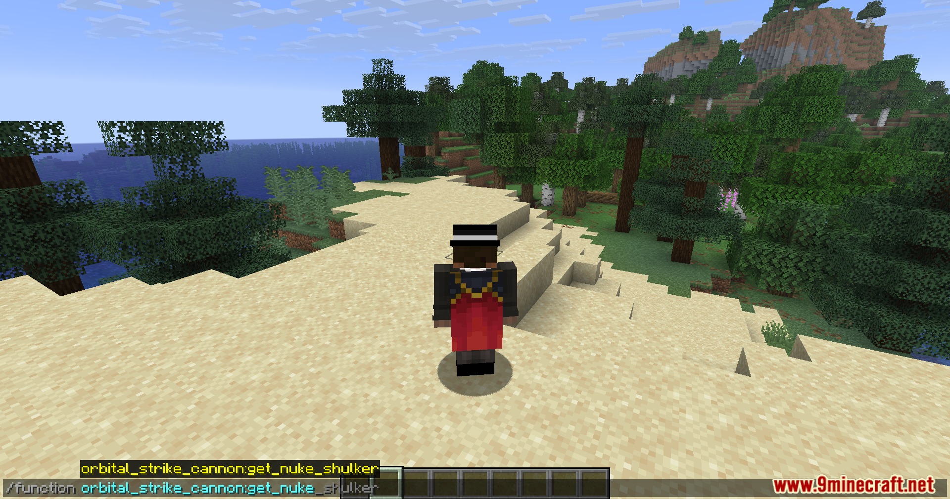 Orbital Strike Cannon Data Pack Screenshot 2 A player character typing a command to obtain items on a sandy beach