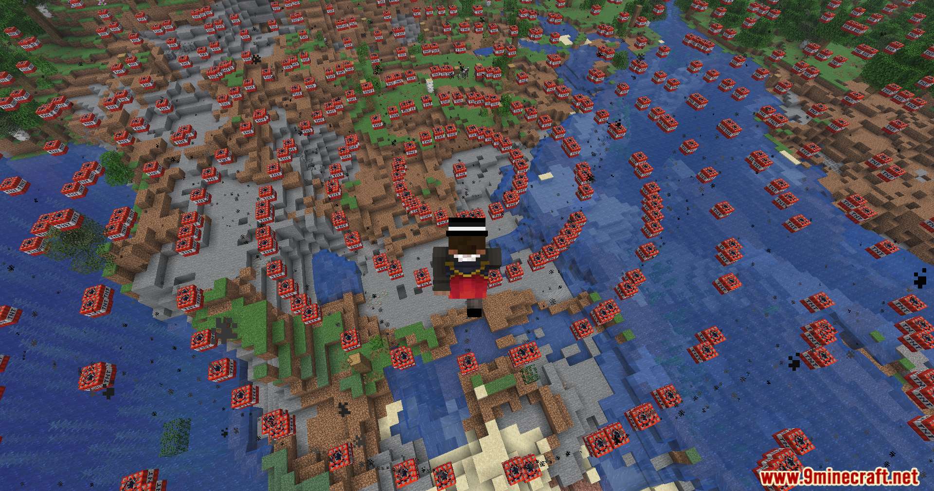 Orbital Strike Cannon Data Pack Screenshot 7 A player character flies over a landscape covered in TNT blocks