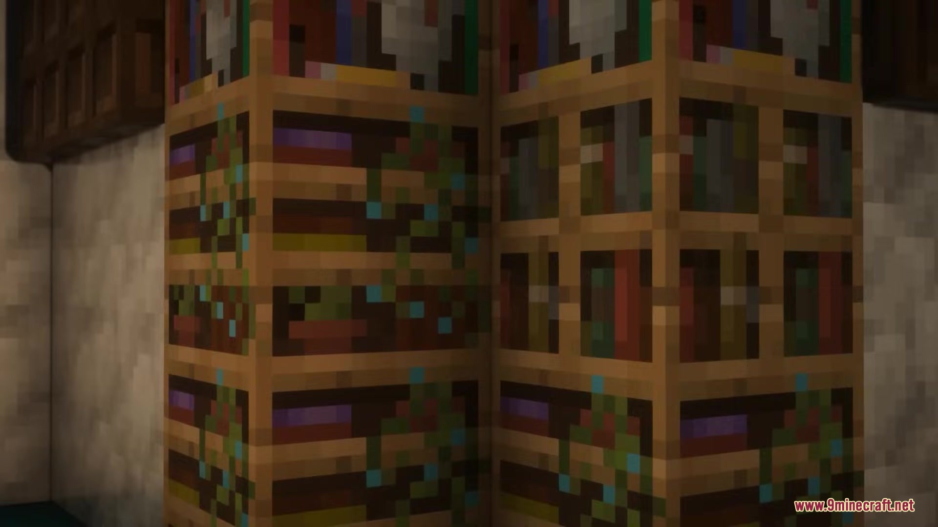 Detailed view of wooden bookshelves featuring small green plants for extra decoration