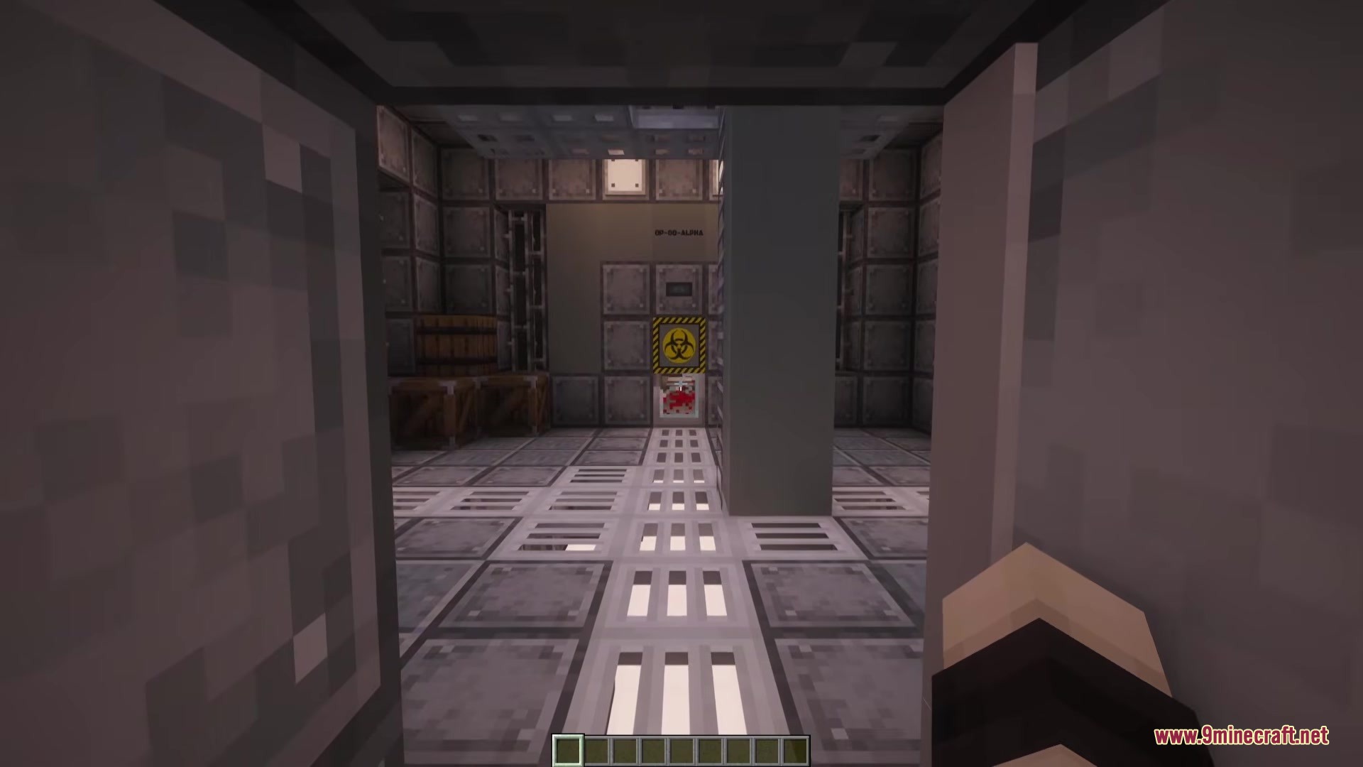 Outpost Zero Mod Screenshot 1 A player looks into a metallic underground bunker with industrial blocks and crates