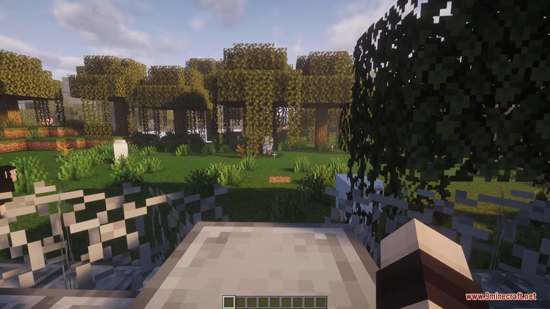 Outpost Zero Mod Screenshot 7 First person view looking out at a forest with trees covered in vines