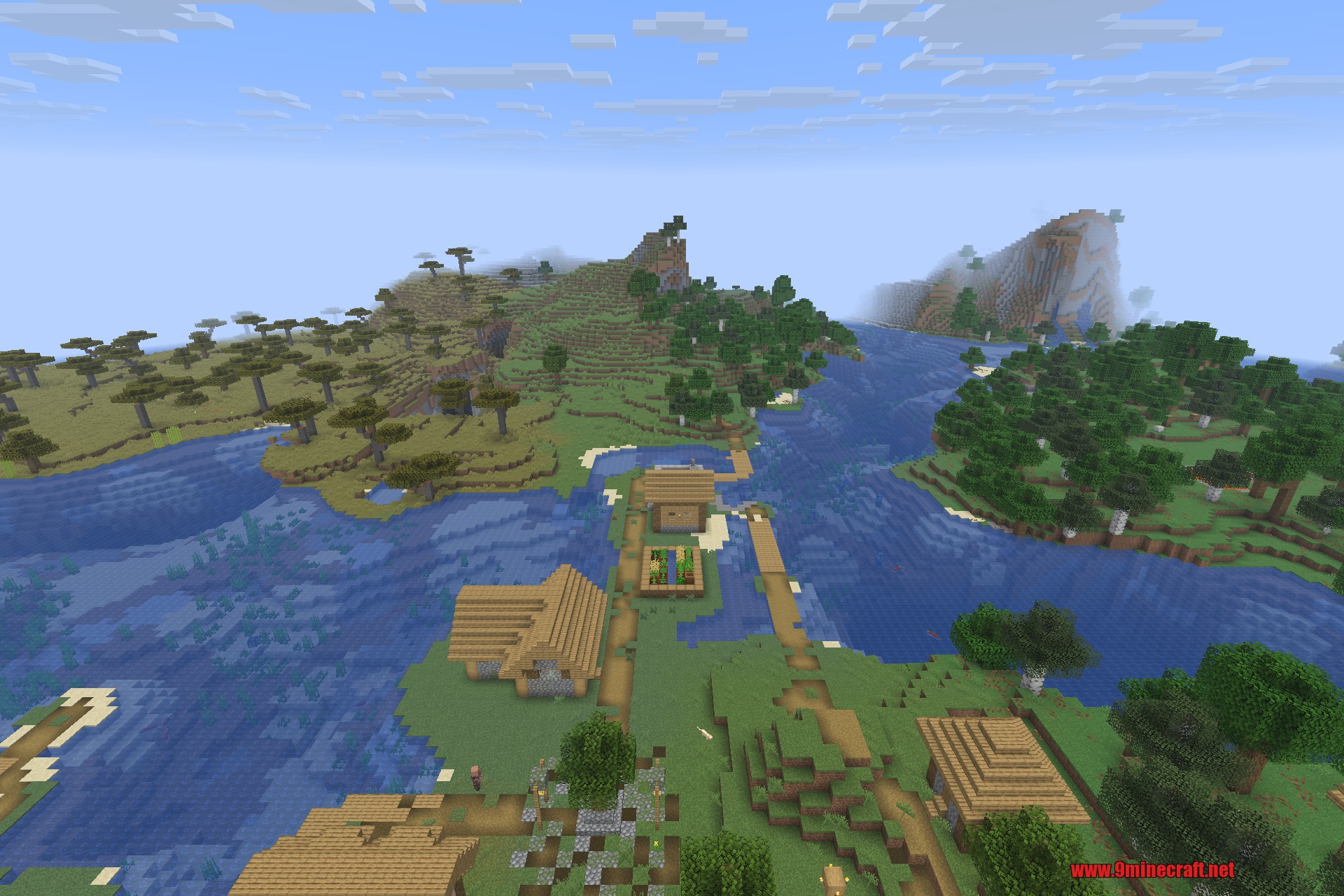 Overhauled Village 9minecraft Mod Screenshot 6 A village built across a river with wooden bridges connecting different biome areas