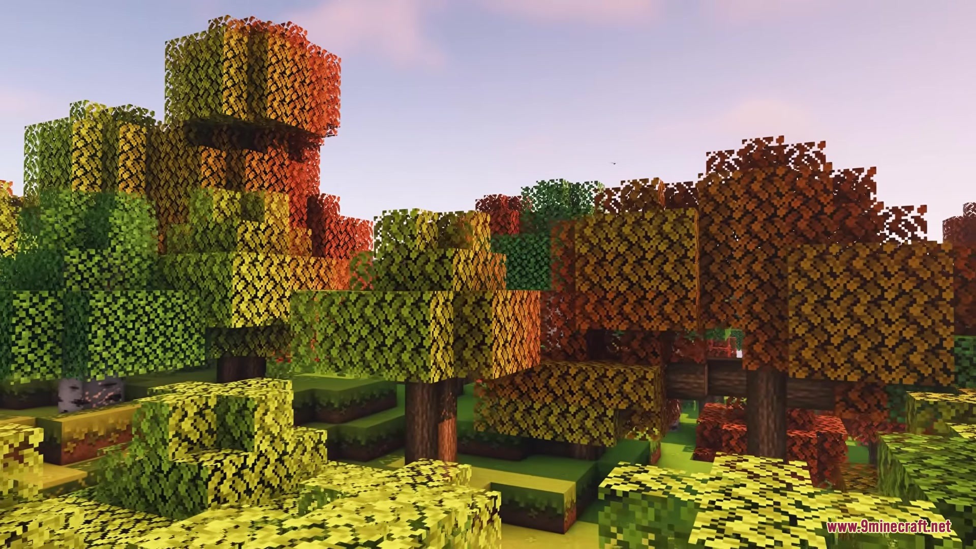 Owange's Autumn Overlay Resource Pack Screenshot 8 Vibrant yellow and orange leaves cover the trees in a blocky autumn forest