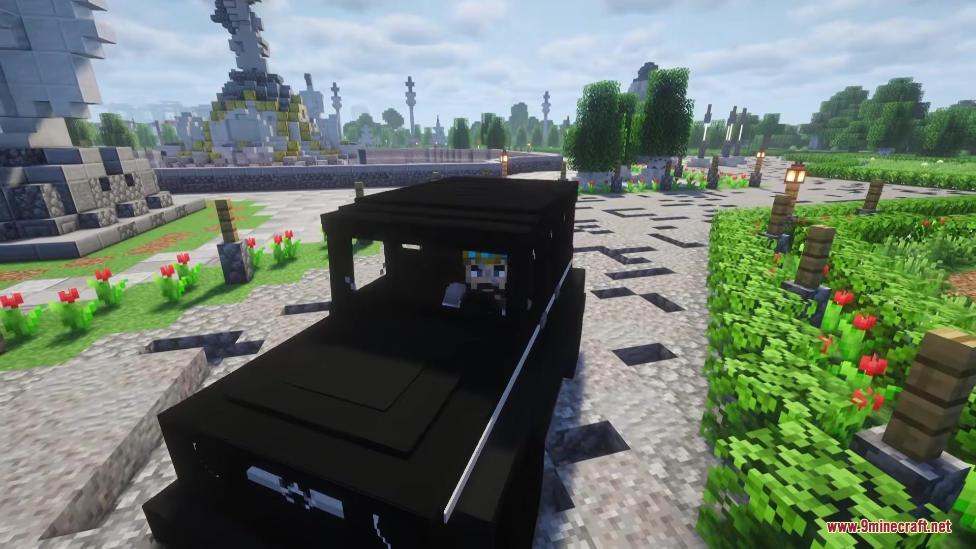 P Dcar G63 Mod Screenshot 4 The player character drives a black vehicle along a path in a park