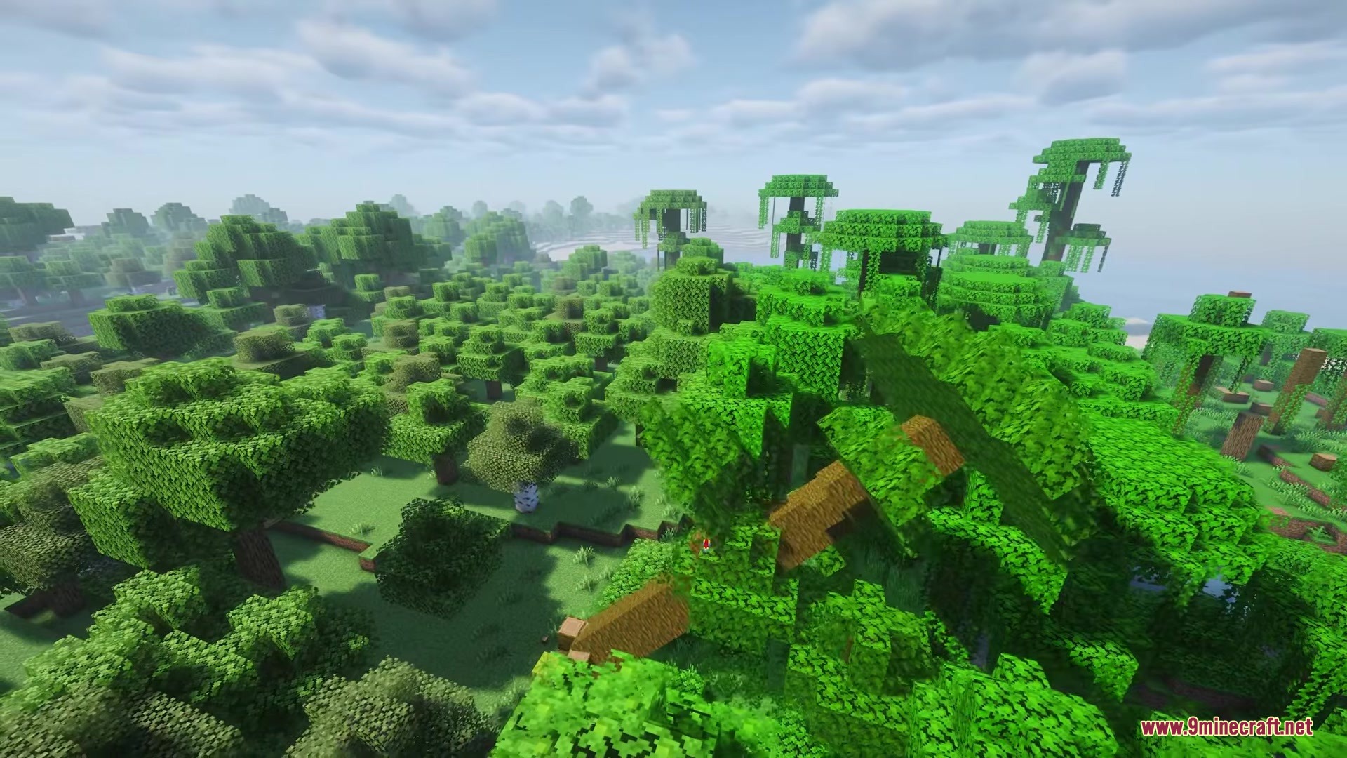 Physics Trees Mod Screenshot 1 A large jungle tree tilting and falling over in a lush green forest