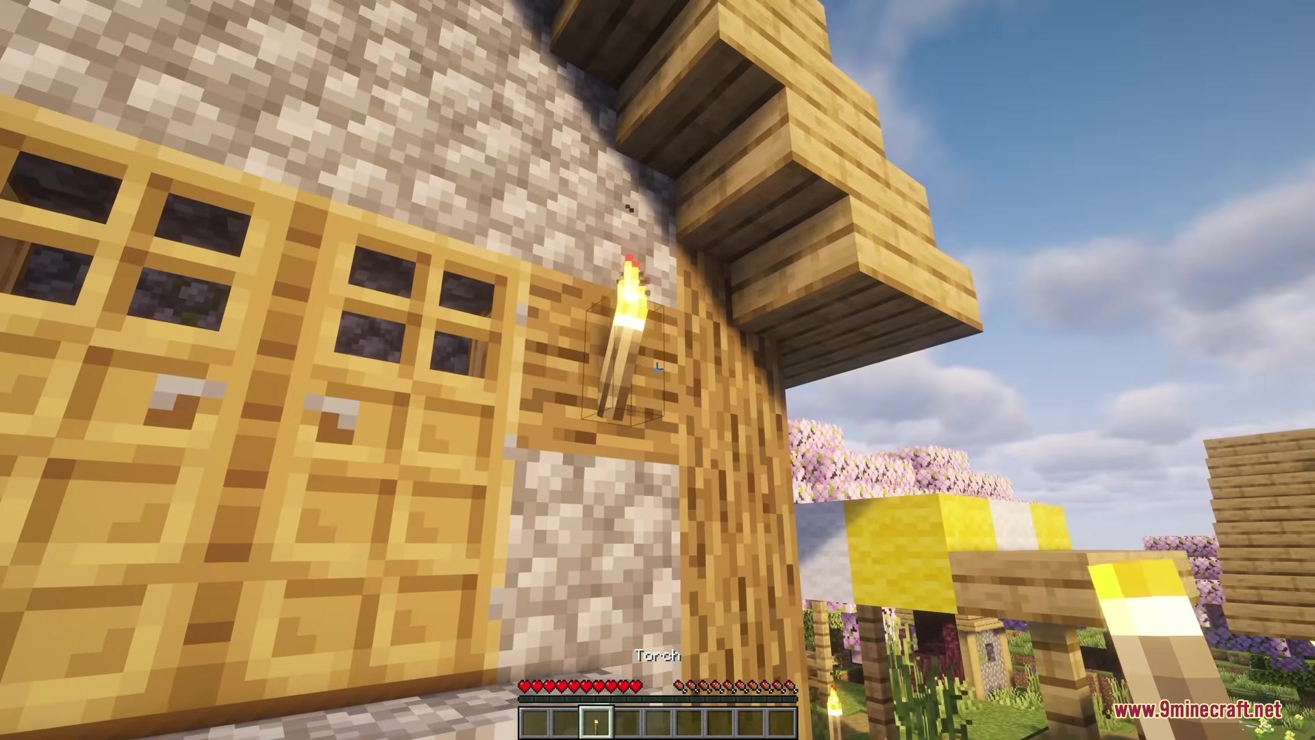 Picker Upper Mod Screenshot 1 Player using Picker Upper Mod to pick up a torch from a wall