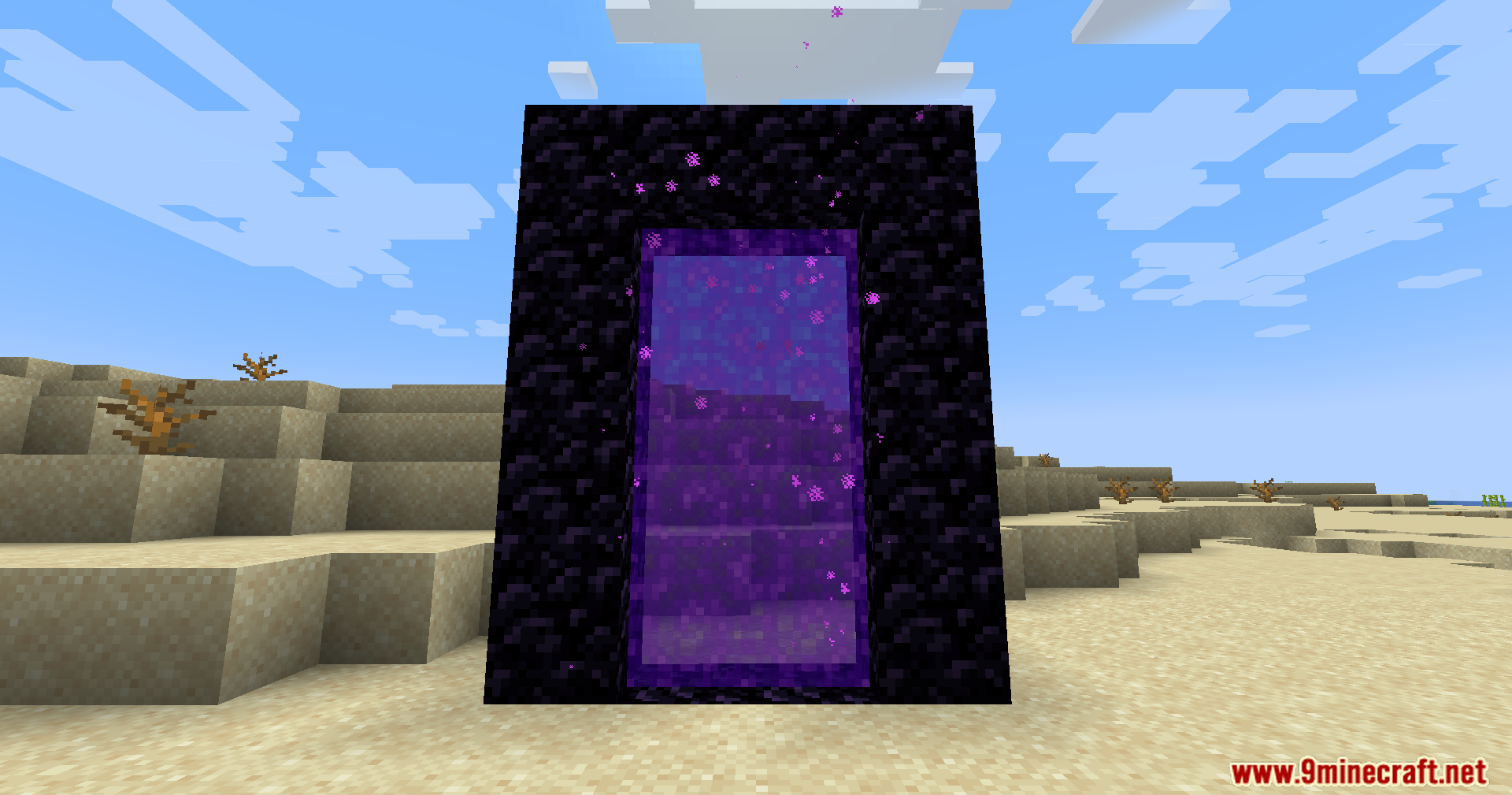 Portal Restrict Mod Screenshot 2 An obsidian Nether portal frame with purple glowing particles in a desert