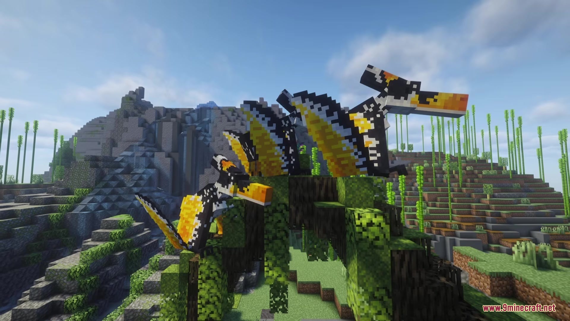 Three yellow and black Pteranodons perched on a leafy green archway