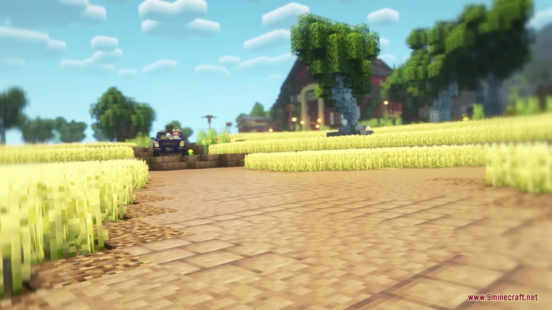 Prime Slayer Demon Slayer Mod Screenshot 3 A blue truck driving through a golden wheat field on a sunny day