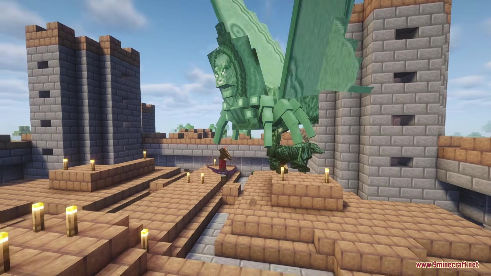 Proyect Berserk Mod Screenshot 5 A giant green winged boss monster hovering above a stone castle courtyard