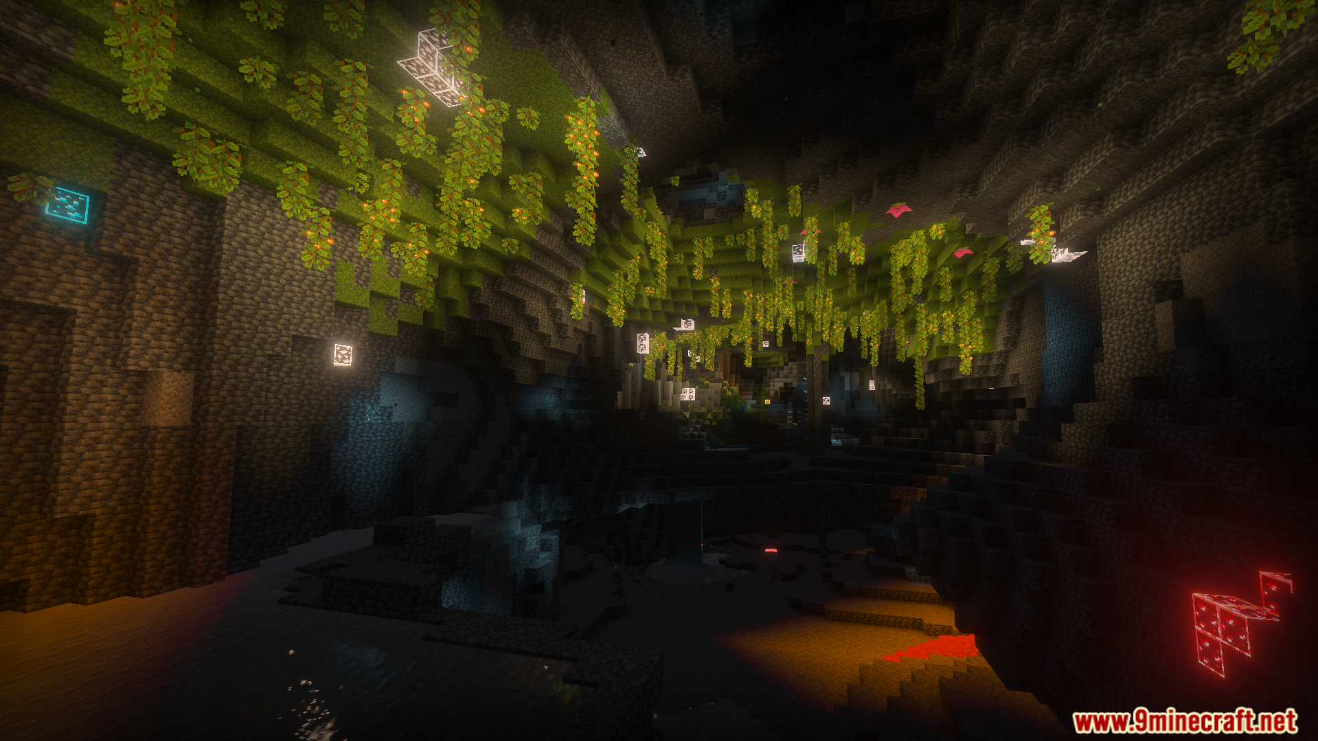 Glowing ores light up a dark cave filled with hanging green vines
