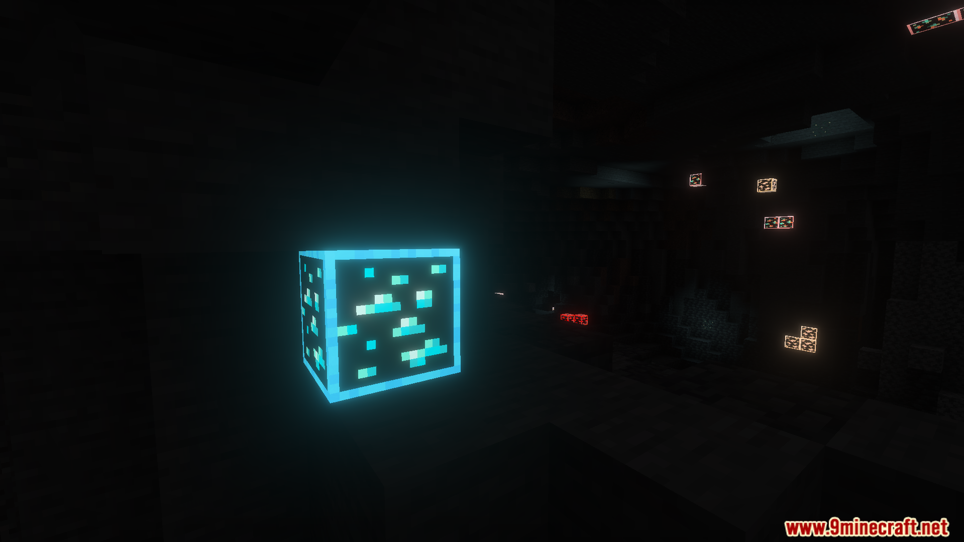 A diamond ore block with a bright icy blue gleam in a cave
