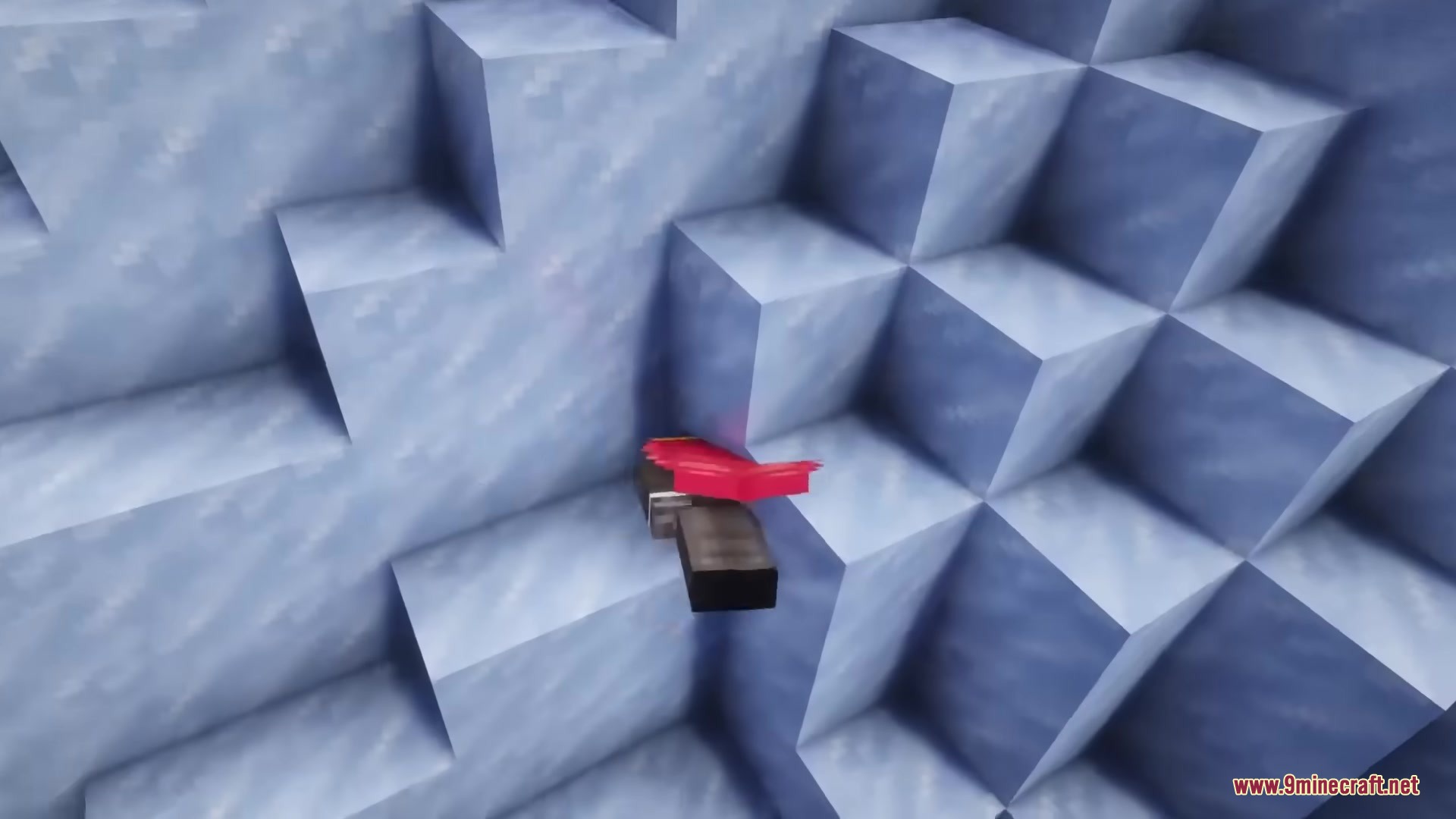 A player character flopping onto blue ice blocks after crashing at high speed