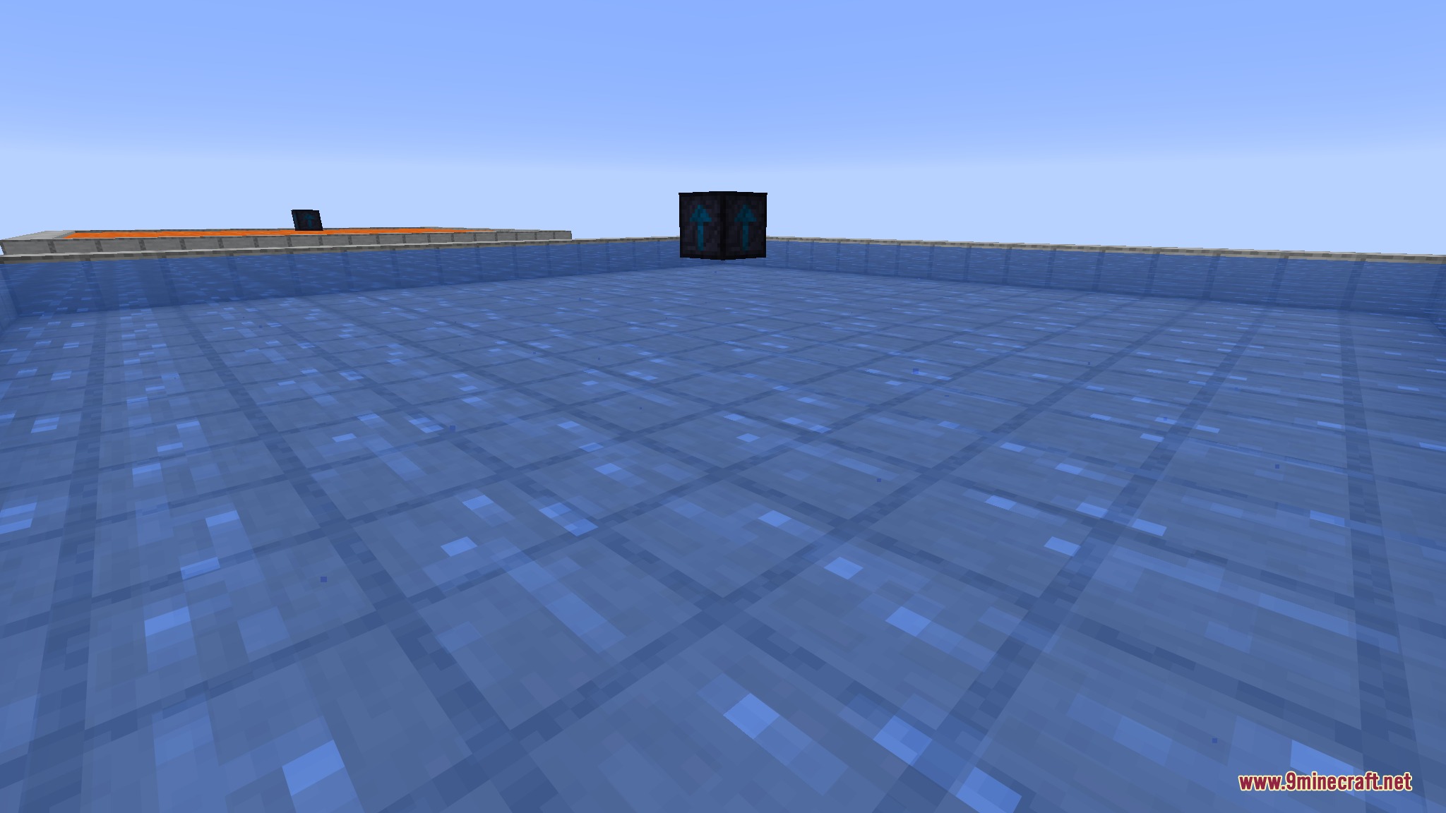 Northwest diagonal - water pump centered over the pool in natural daylight