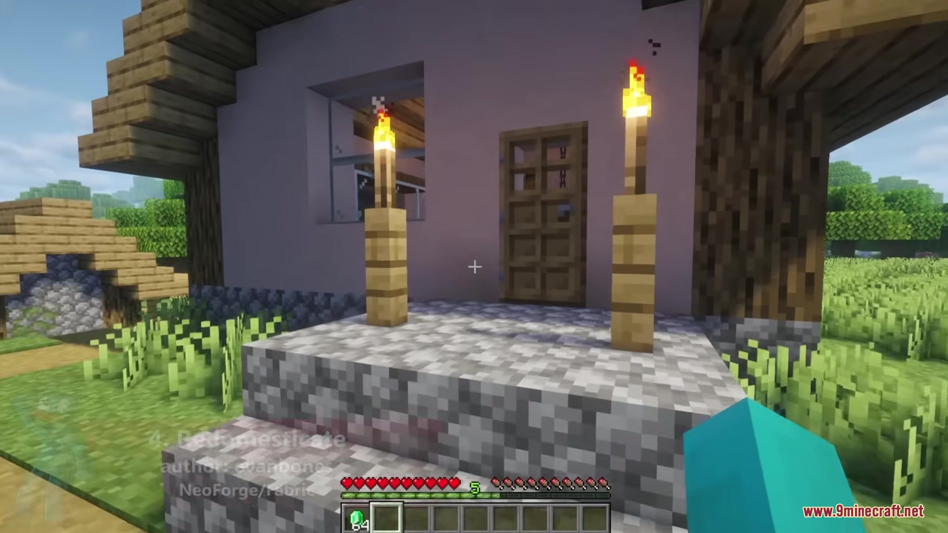 Redomesticate Mod Screenshot 3 Exterior of a villager house with a cobblestone porch and wooden door