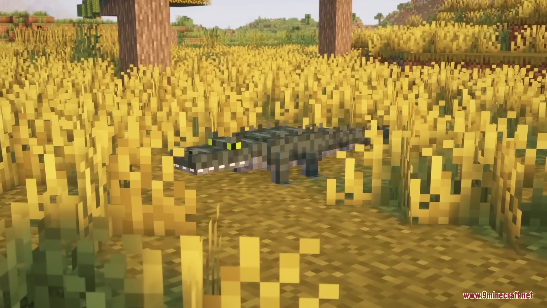 Reptilian Mod Screenshot 2 A green alligator hides in the tall yellow grass of a swamp