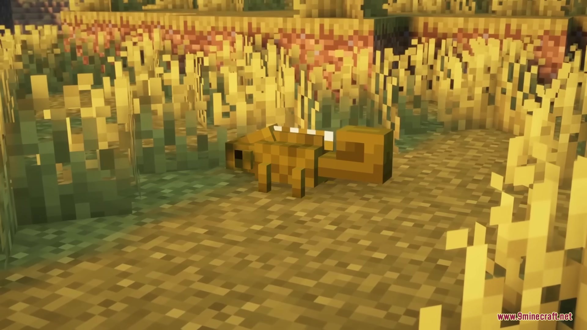 Reptilian Mod Screenshot 5 A tiny yellow gecko stands amidst tall grass in a Minecraft world