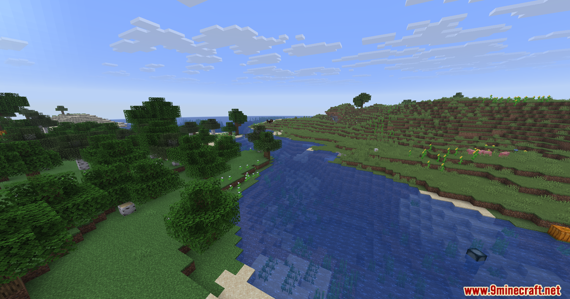 Rescale Aspect Ratio Mod Screenshot 10 Wide landscape view of a river winding through hills and forests in Minecraft