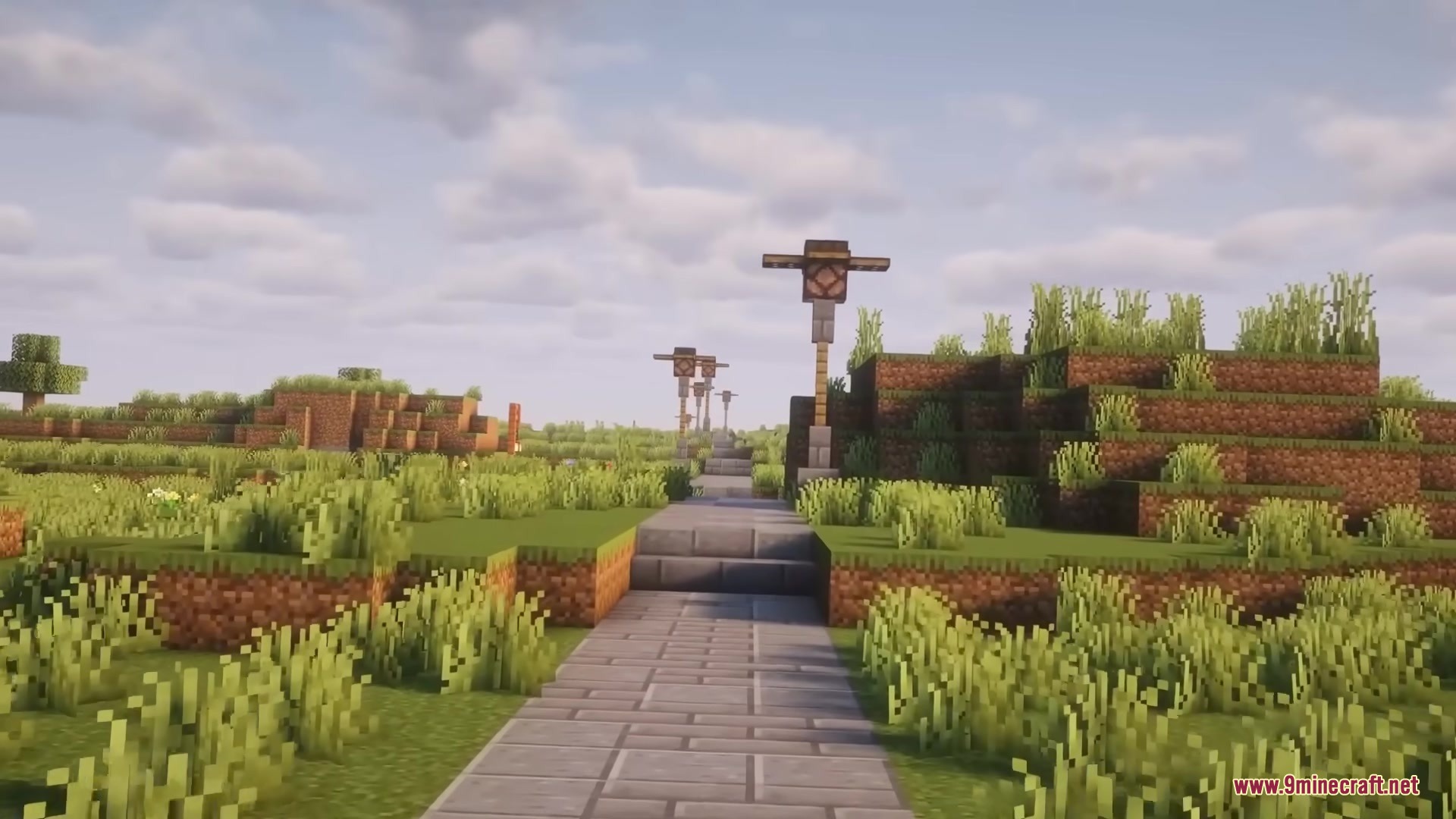 A stone brick road with lamp posts built by the Roadweaver Mod