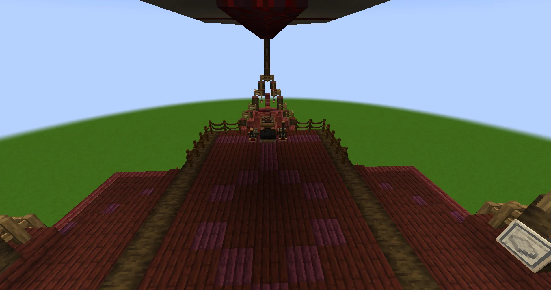 Rootrunner Schematic Screenshots 2 The wooden deck of a red airship overlooking a flat green world