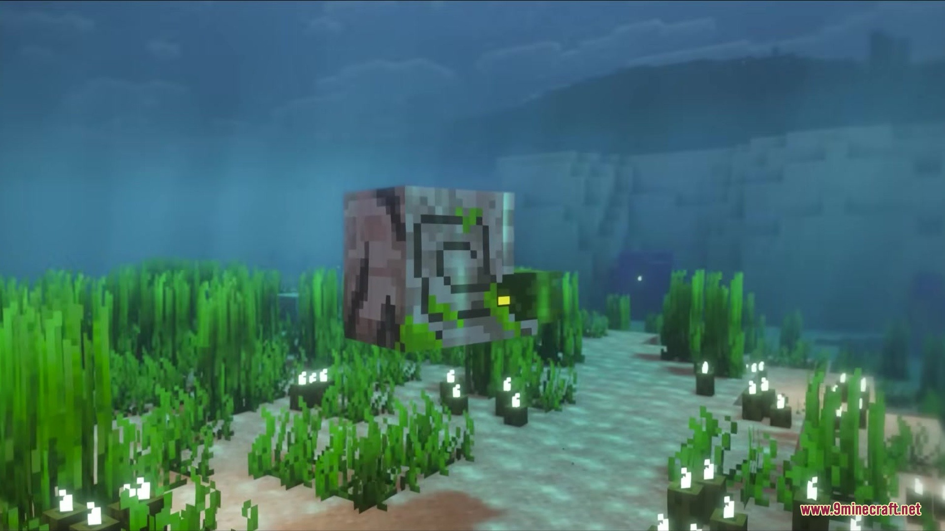 A blocky Nautilus mob swims through seagrass on the ocean floor in Minecraft