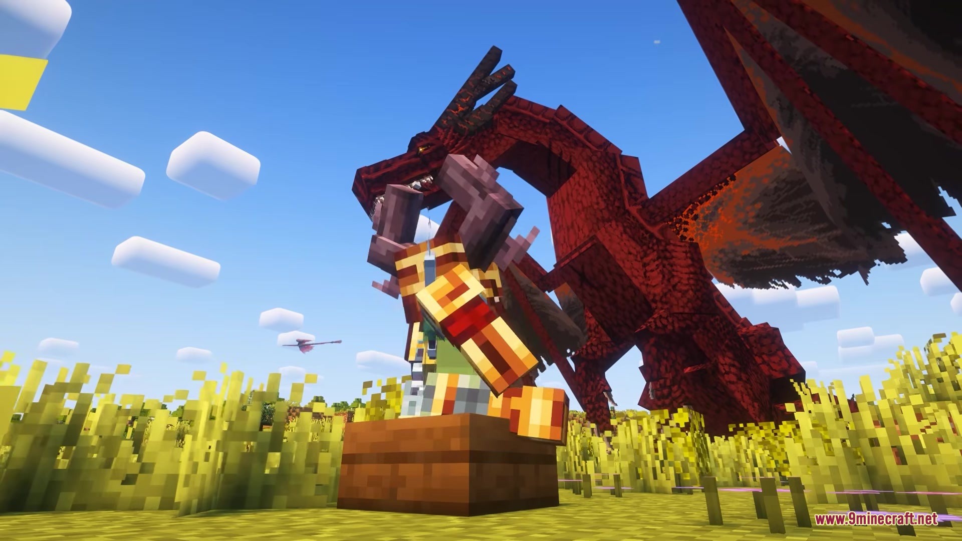 Saint's Dragons Mod Screenshot 10 A player stands next to a huge red dragon in a wheat field