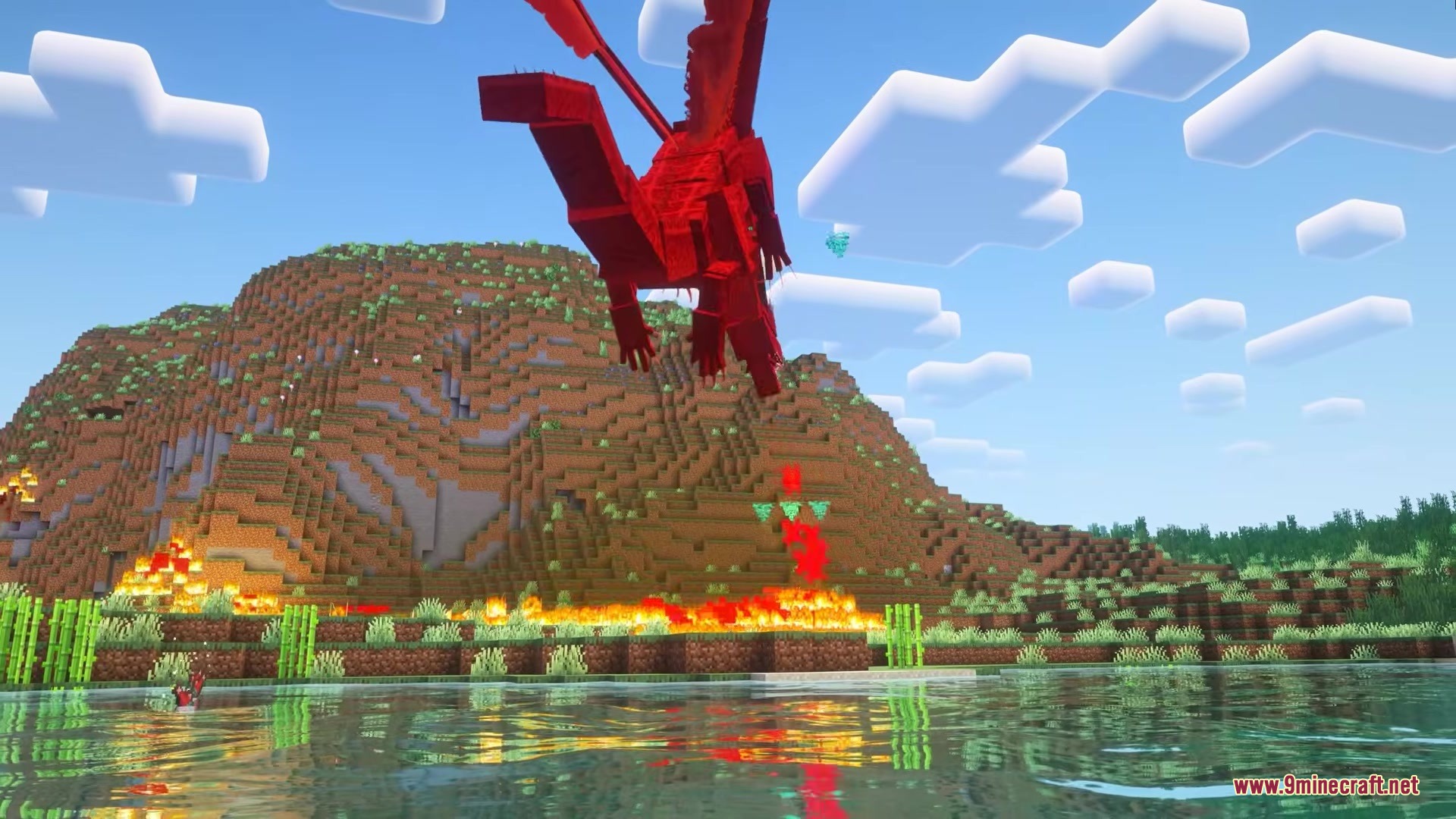 Saint's Dragons Mod Screenshot 9 A red dragon soaring through the sky above a burning mountain and lake