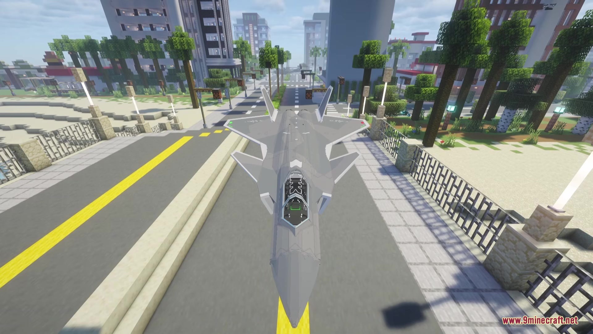 Sbw Drr Mod Screenshot 9 A grey fighter jet flying low over a modern city street in Minecraft