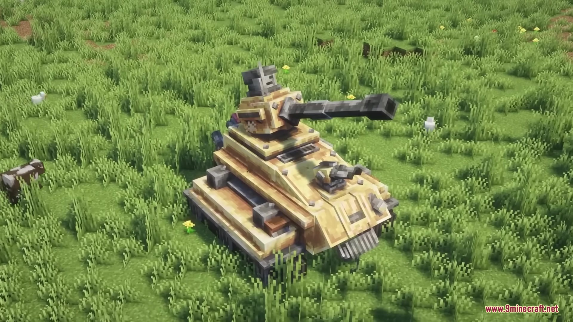 Scorched Guns Neoforged Mod Screenshot 3 A tan combat tank with a large cannon resting in a grassy field