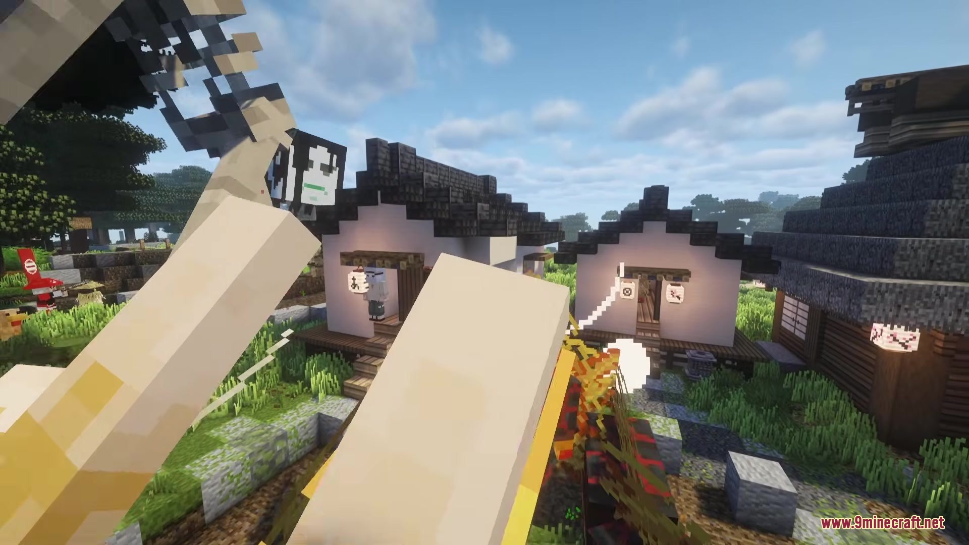 First person perspective of a giant skeleton standing near traditional Japanese village houses
