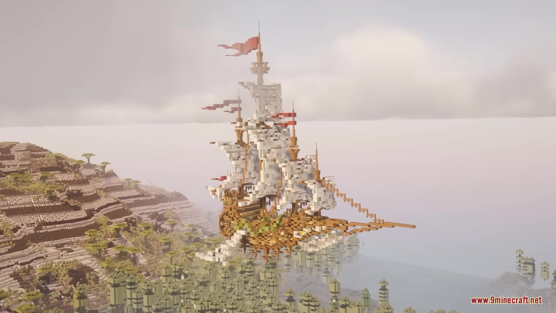ShellBound for Airship Mod Screenshot 1 A massive wooden airship with white sails floats above a mountain landscape