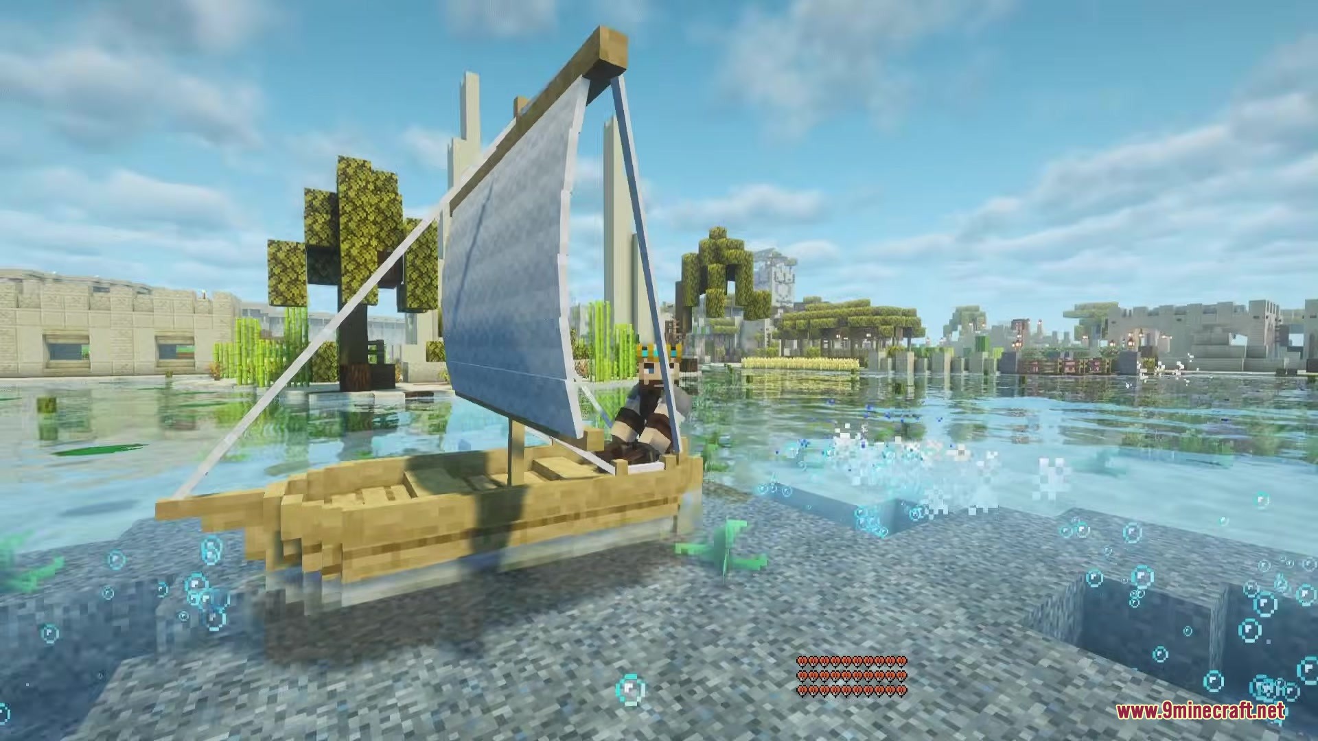 Shippy Ships Mod Screenshot 1 A player navigating a small wooden sailboat with white sails through clear water