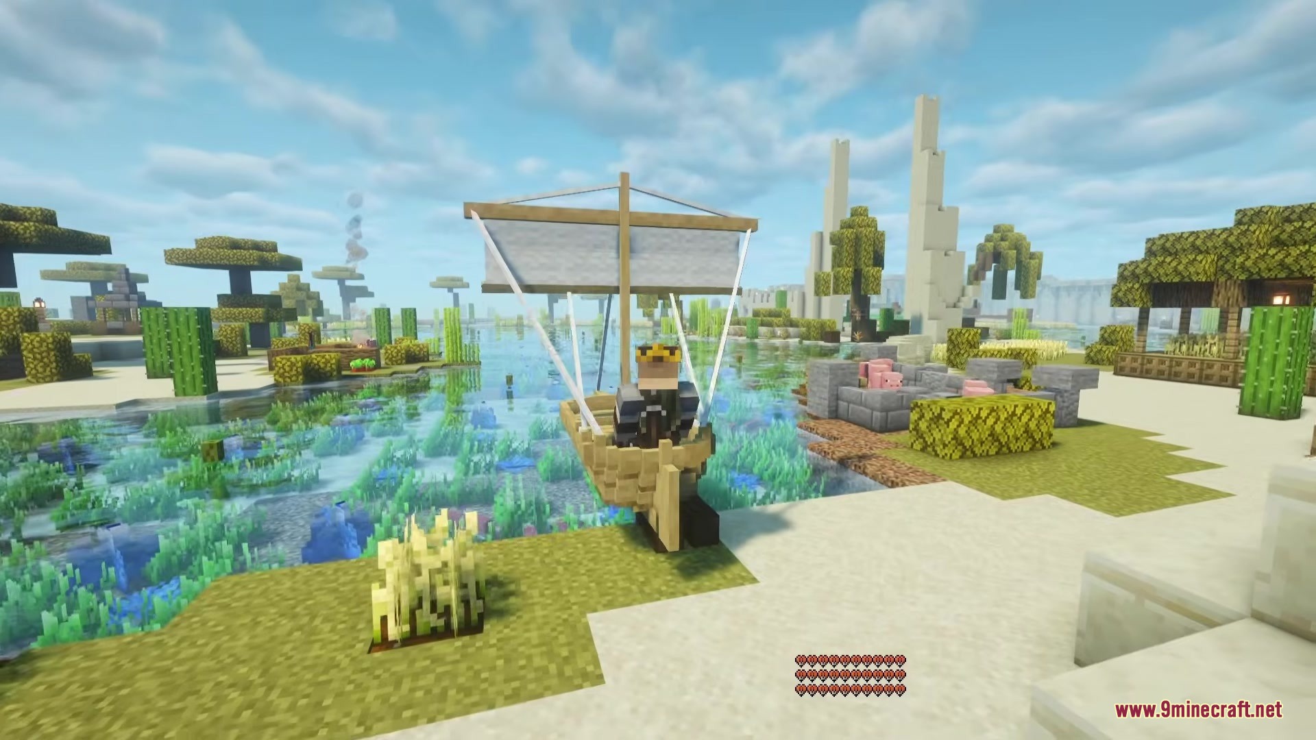 Shippy Ships Mod Screenshot 2 A player sitting in a small wooden sailboat resting on a sandy beach