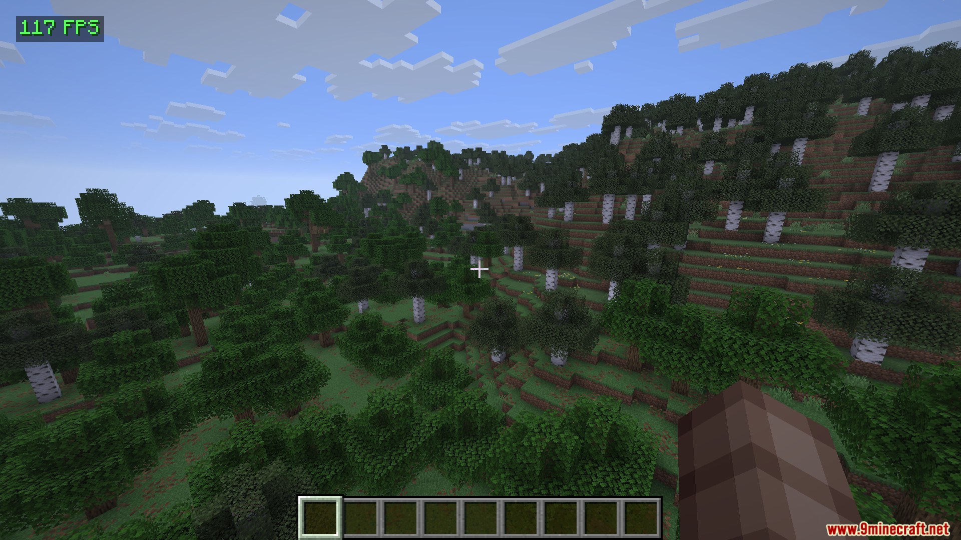 Show FPS Mod Screenshot 2 Green frame rate counter shown while looking at a dense forest biome