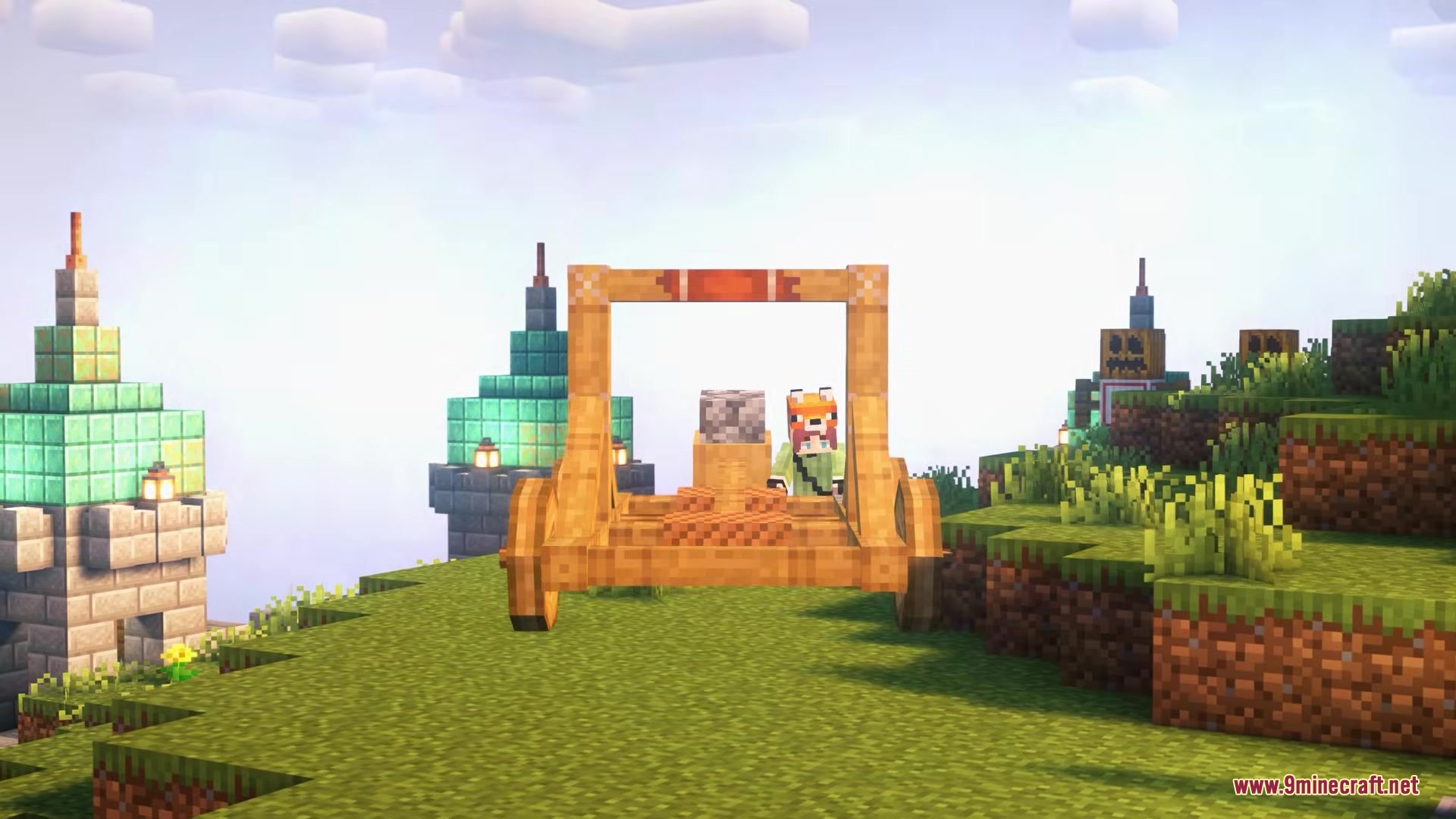 Siegeweapons Mod Screenshot 2 A player stands behind a large wooden catapult on a grassy hill