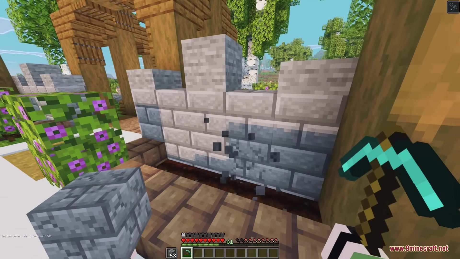 Simple Swap Mod Screenshot 4 A player uses a diamond pickaxe to swap stone bricks near wooden structures