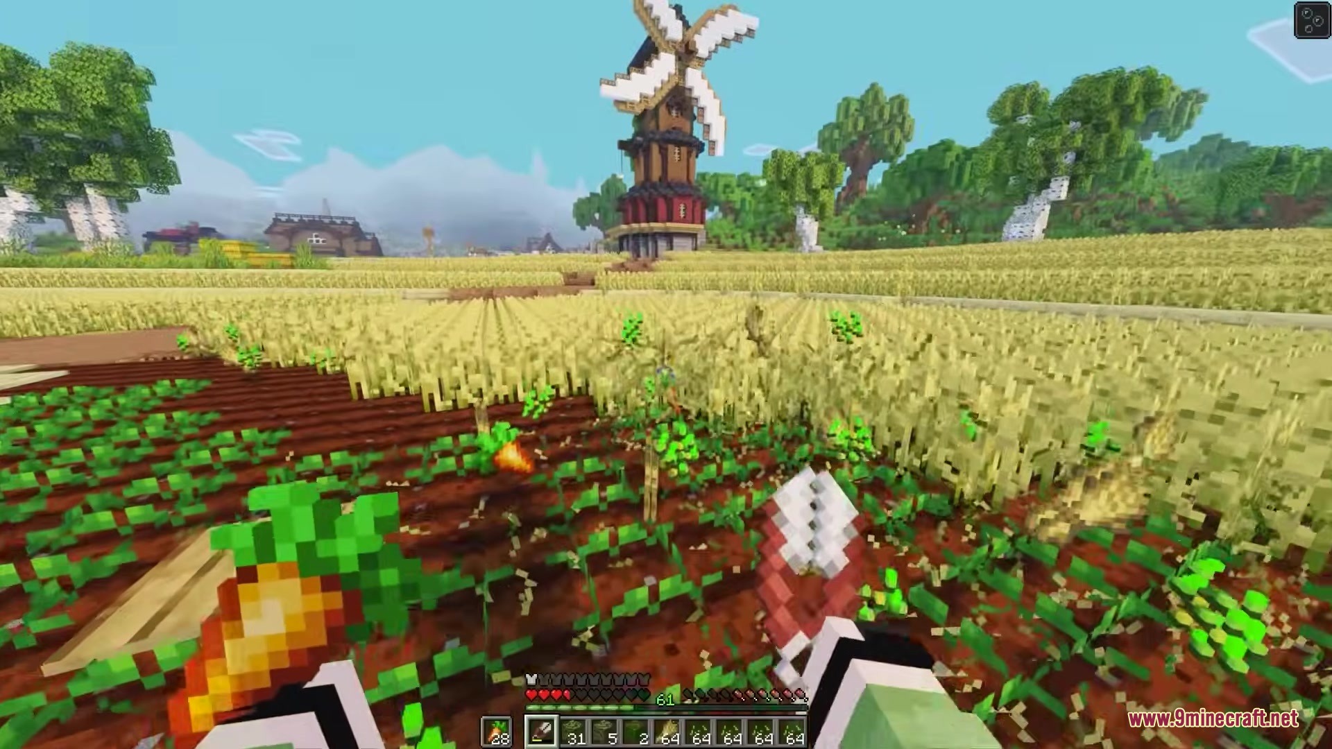 Simple Swap Mod Screenshot 7 Player holding shears in a vast farm field with a tall windmill background