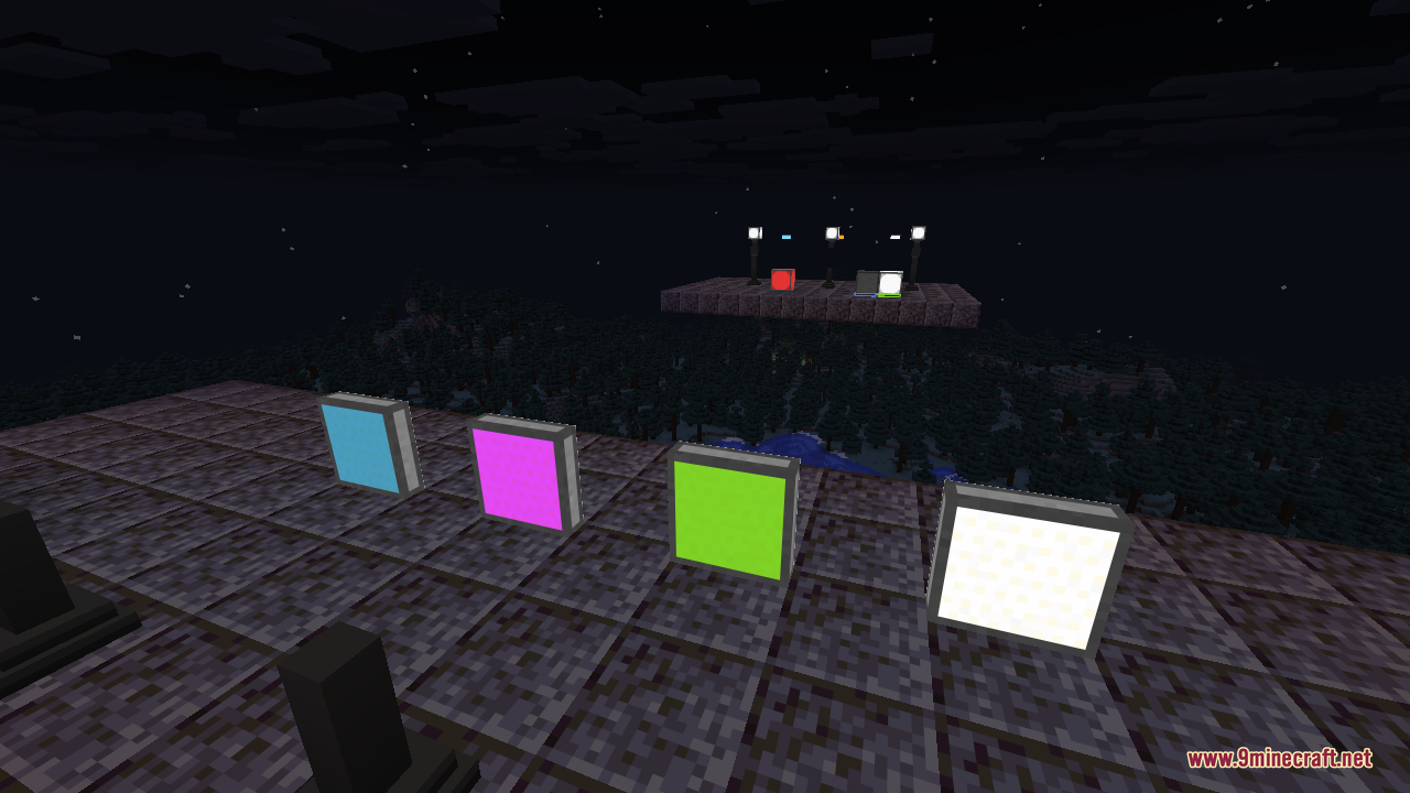 Four coloured illuminant panels, in light blue, magenta, lime, and glowing white, standing upright on a stone floor and lighting the darkness of a snowy night