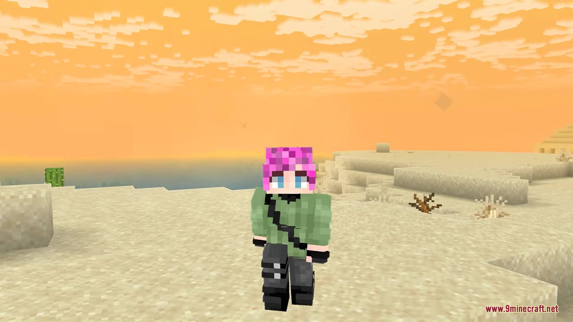 Skincraft Mod Screenshot 2 A character with pink hair wearing a green shirt in a sandy desert